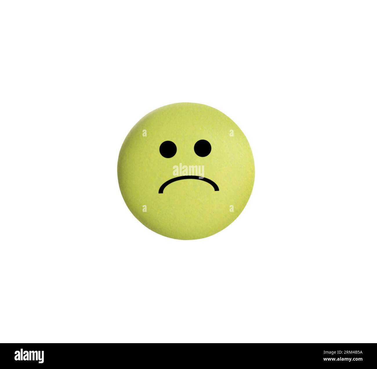Yellow pill with sad face on white background Stock Photo - Alamy