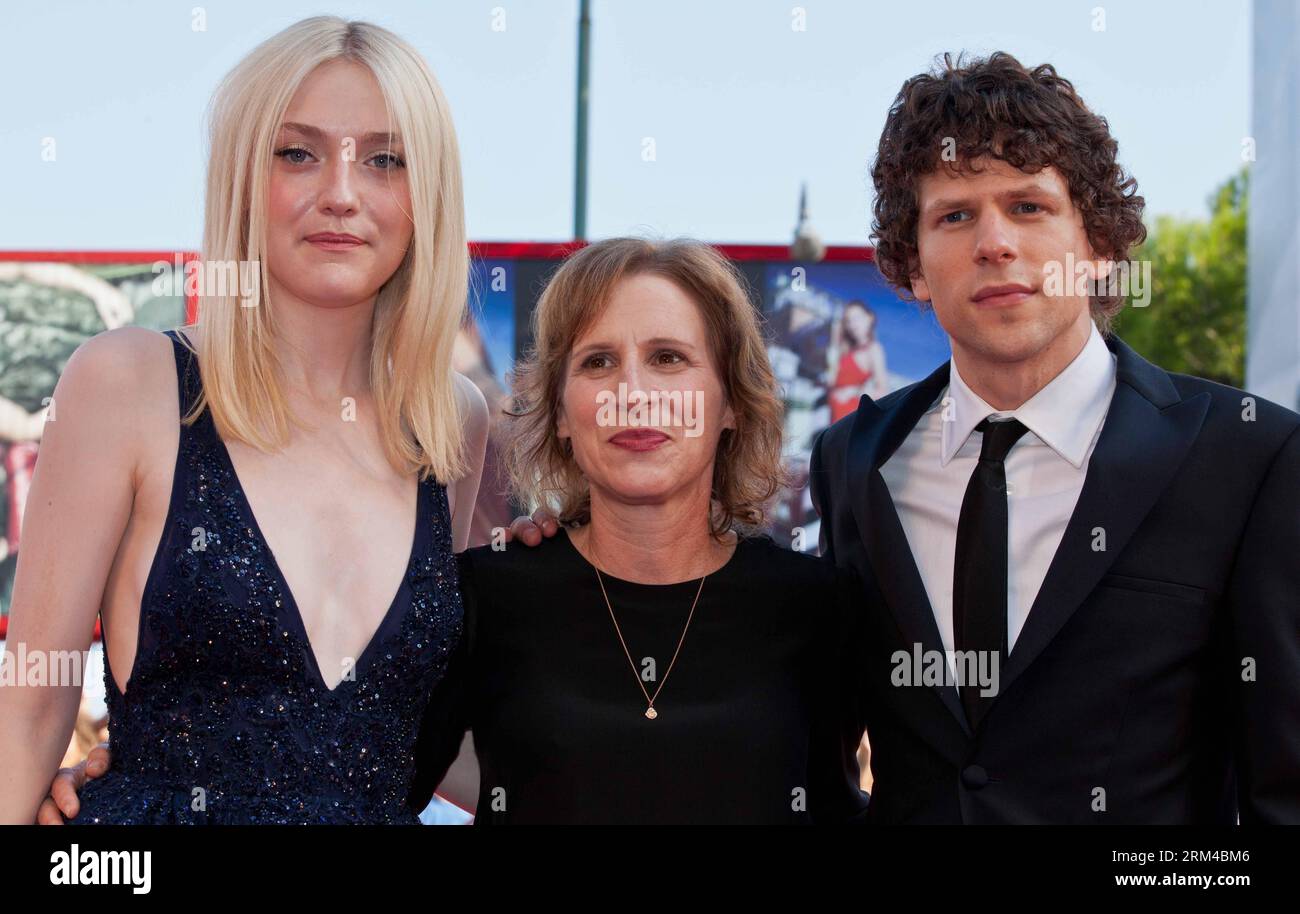VENICE, Aug. 31, 2013 -- Dakota Fanning L, Jesse Eisenberg R and Kelly Reichardt of the 70th Venice International Film Festival movie Night Moves  poses at red carpet on the Lido island of Venice , Italy, Aug. 31, 2013. Xinhua/Yan Ting ITALY-VENICE-FILM-FESTIVAL-NIGHT MOVES PUBLICATIONxNOTxINxCHN Stock Photo