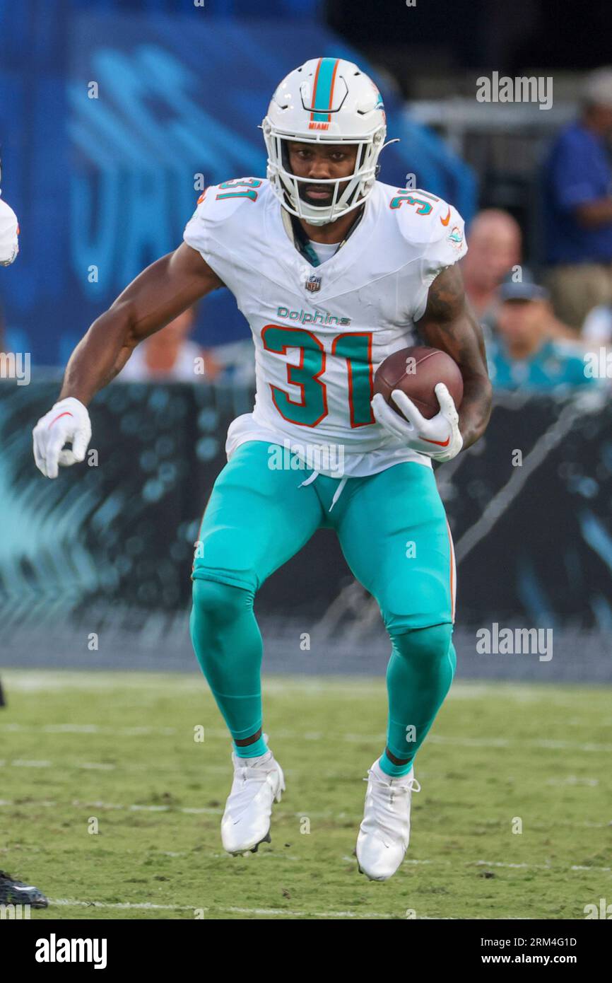 Miami Dolphins running back Raheem Mostert (31) runs for a