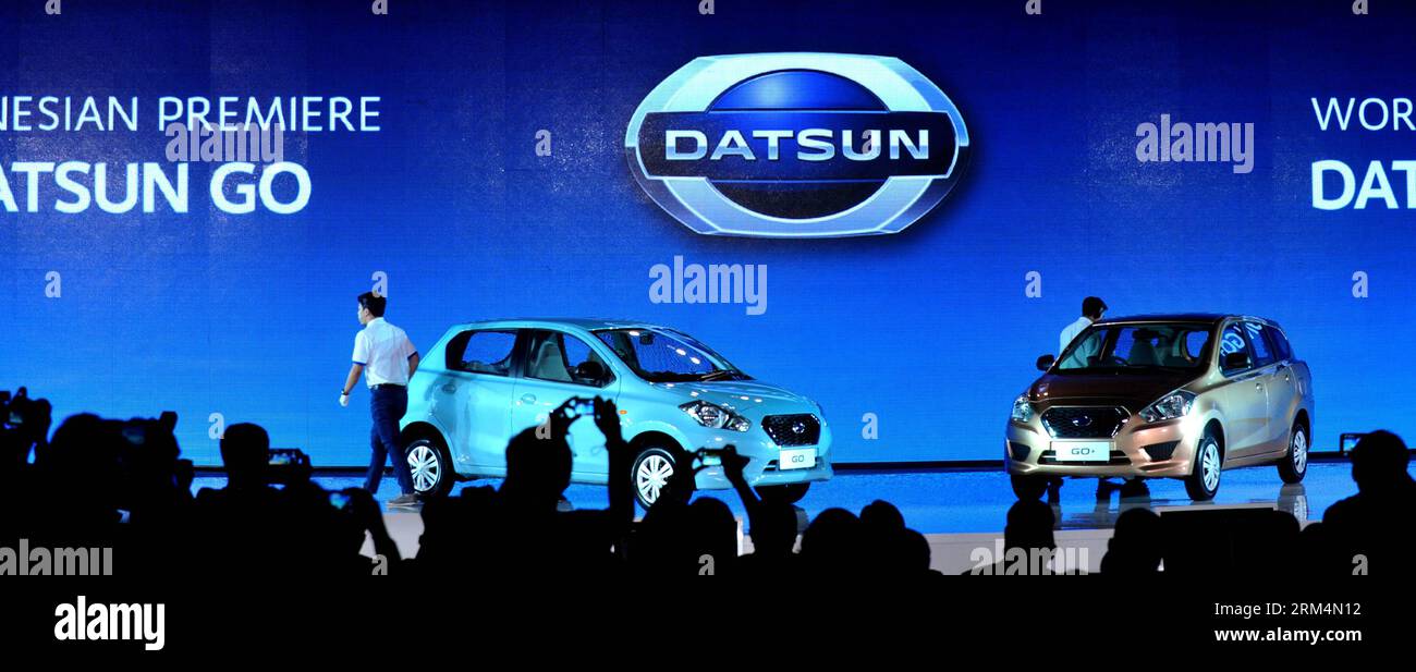 Bildnummer: 60489603  Datum: 17.09.2013  Copyright: imago/Xinhua JAKARTA,  -- look at Datsun automobiles during a launching ceremony in Jakarta, Indonesia, Sept. 17, 2013. Datsun comes back to Indonesia after 32 years. (Xinhua/Agung Kuncahya B.)(lrz) INDONESIA-JAKARTA-LAUNCHING-DATSUN PUBLICATIONxNOTxINxCHN Wirtschaft people x0x xkg 2013 quer premiumd     60489603 Date 17 09 2013 Copyright Imago XINHUA Jakarta Look AT Datsun Automobiles during a Launching Ceremony in Jakarta Indonesia Sept 17 2013 Datsun COMES Back to Indonesia After 32 Years XINHUA Agung Kuncahya B  Indonesia Jakarta Launchin Stock Photo
