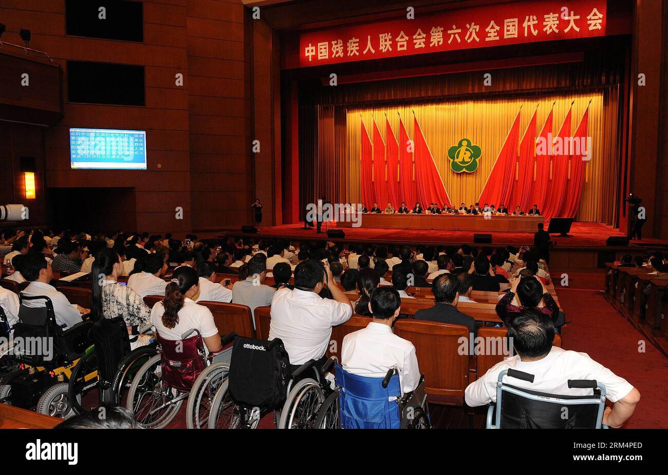 Bildnummer: 60498840  Datum: 19.09.2013  Copyright: imago/Xinhua (130919) -- BEIJING, Sept. 19, 2013 (Xinhua) -- The sixth national congress of the China Disabled Persons Federation (CDPF) is concluded in Beijing, capital of China, Sept. 19, 2013. Wheelchair-bound writer Zhang Haidi was reelected as chairwoman of the CDPF at the congress on Thursday. Deng Pufang was reelected as the CDPF s honorable chairman. (Xinhua/He Junchang) (wqq) CHINA-BEIJING-DISABLED PERSONS FEDERATION-NATIONAL CONGRESS (CN) PUBLICATIONxNOTxINxCHN xcb x0x 2013 quer      60498840 Date 19 09 2013 Copyright Imago XINHUA Stock Photo