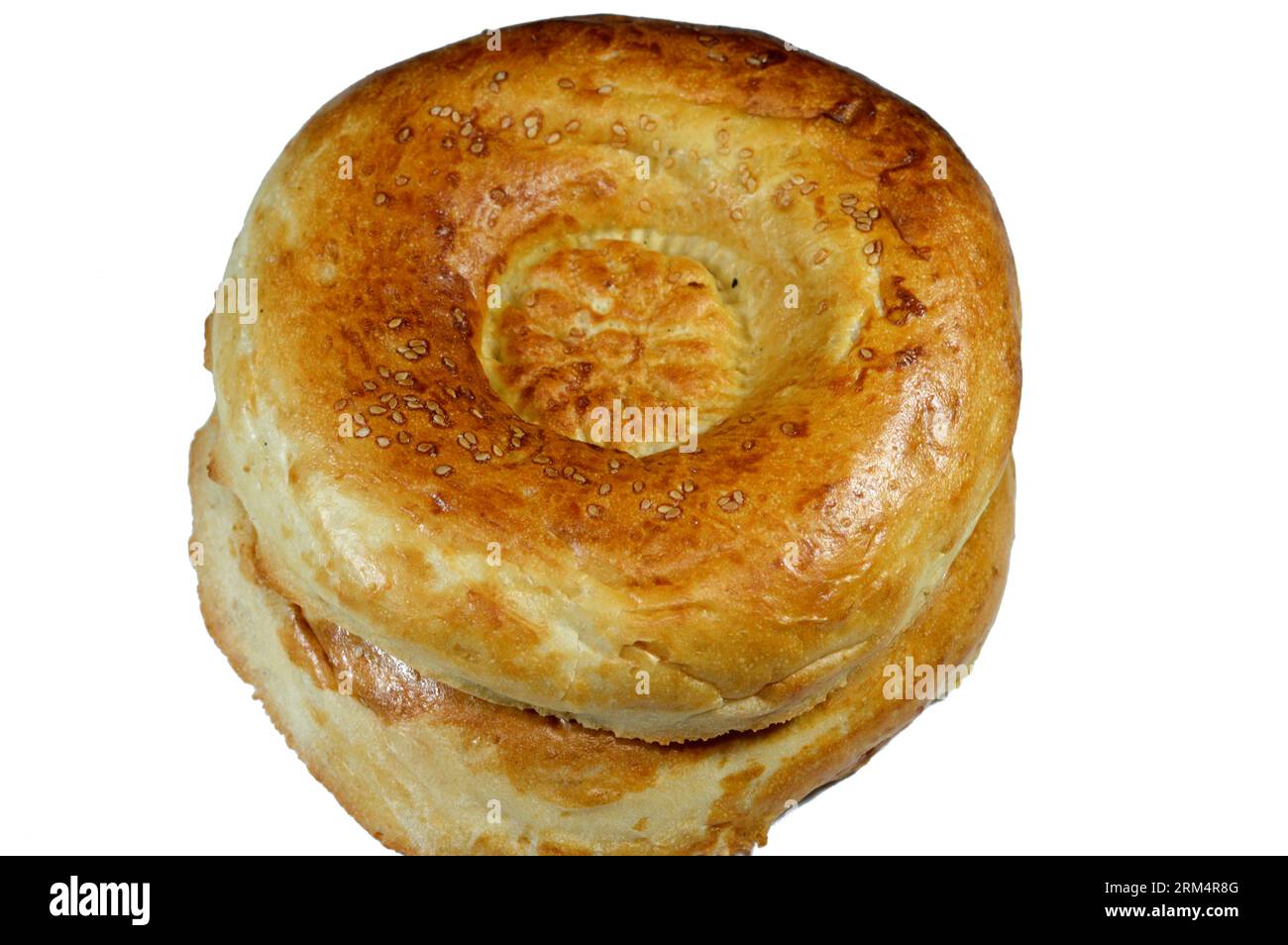 Tandyr nan Uzbek bread, a type of Central Asian bread, often decorated by  stamping patterns on the dough by using a bread stamp known as a chekich,  al Stock Photo - Alamy