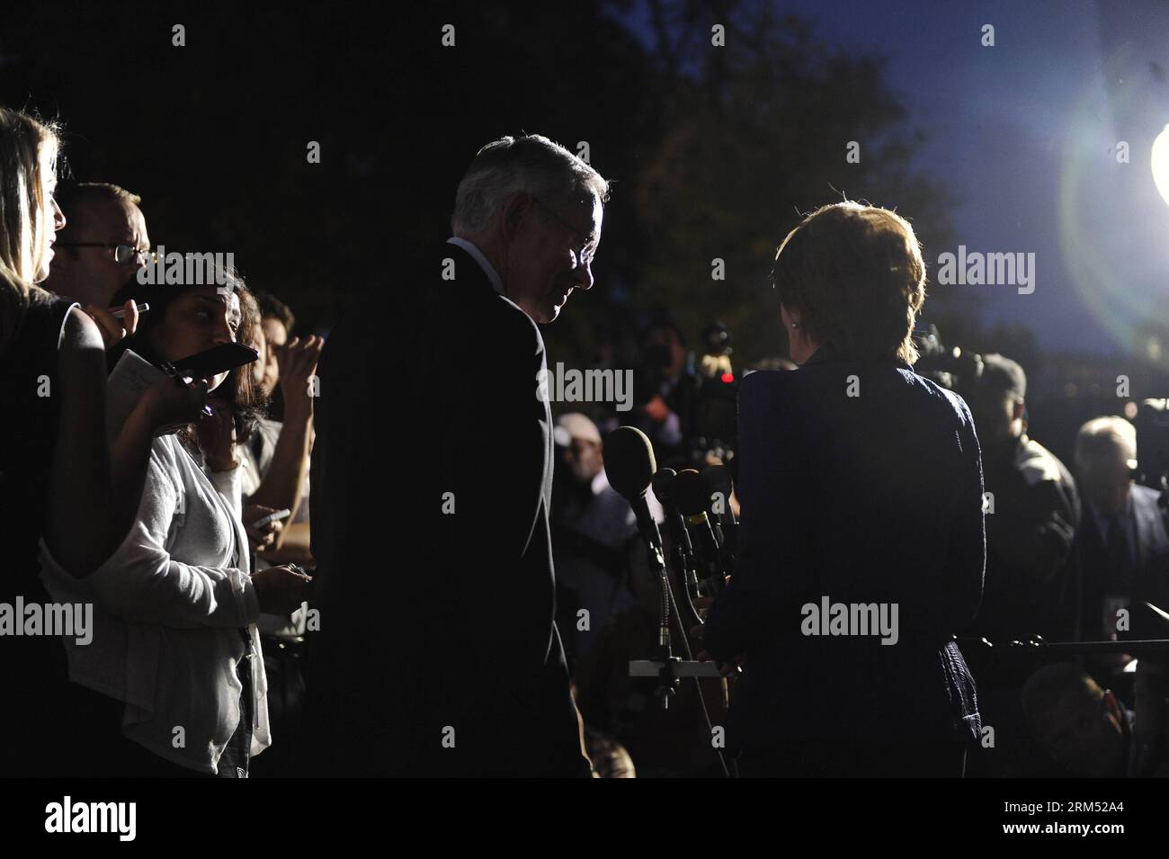 Bildnummer: 60554609  Datum: 02.10.2013  Copyright: imago/Xinhua (131003) -- WASHINGTON, Oct. 3, 2013 (Xinhua) -- US House Democratic leader Nancy Pelosi (R center) and Senate Majority Leader Harry Reid (L center) meet the press after talks with President BarackxObama at the White House in Washington Oct. 2, 2013. BarackxObama met the four top leaders of the Congress at the White House on Wednesday to urge lawmakers to reopen the government and raise the US debt ceiling. (Xinhua/Zhang Jun) US-WASHINGTON-PRESIDENT-CONGRESS LEADERS-MEETING PUBLICATIONxNOTxINxCHN People Politik xns x1x 2013 quer Stock Photo