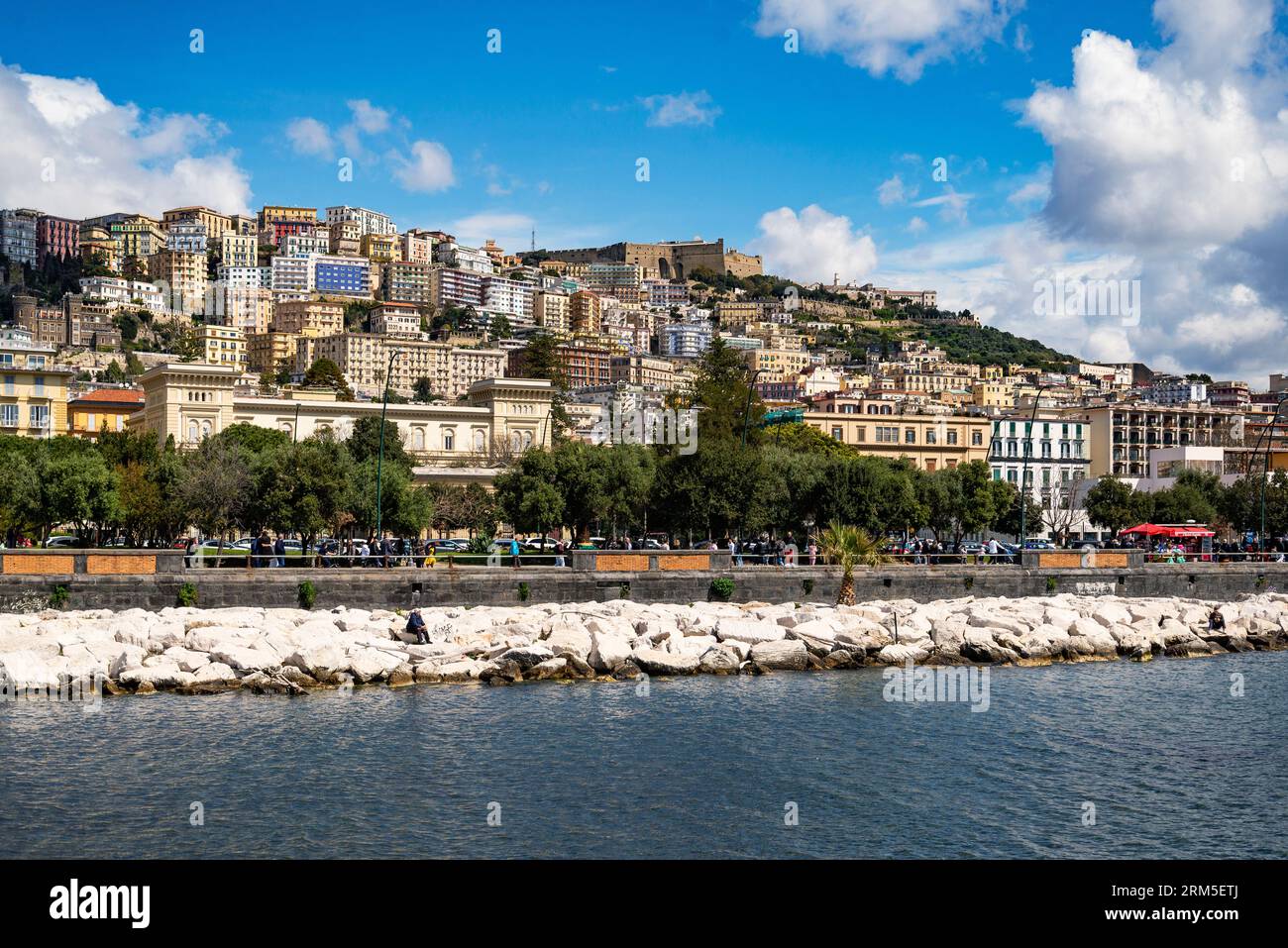Naples, Italy - April 9, 2023: City of Naples seen from the seafront of Naples in Italy Stock Photo