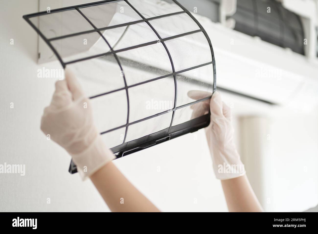 Asian house cleaner cleaning hi-res stock photography and images - Alamy