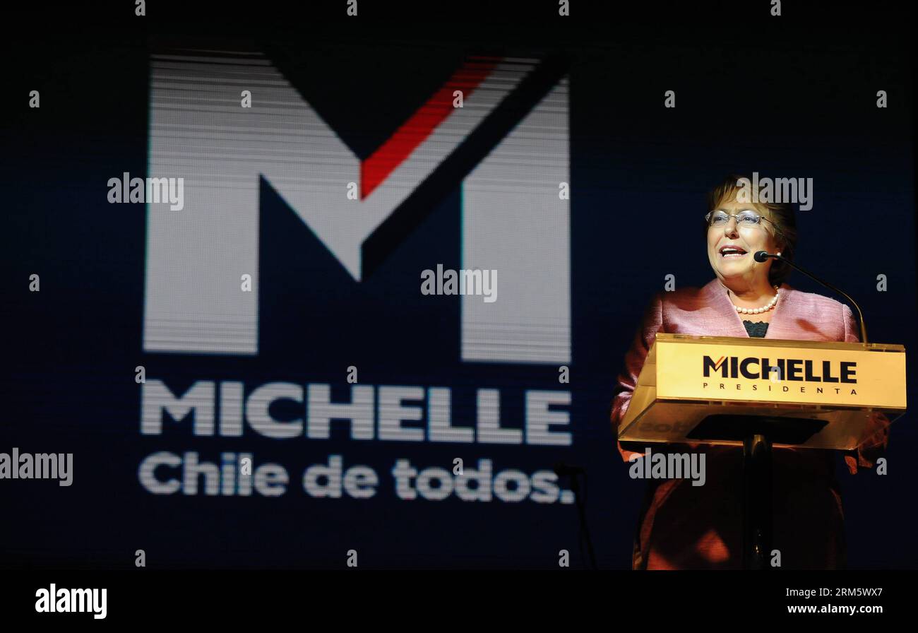 Michelle Bachelet, Chilean presidential candidate of the opposition center-left New Majority coalition, delivers a speech in front of San Francisco hotel, in Santiago, capital of Chile, on Nov. 17, 2013. Although Chile s opposition presidential candidate Michelle Bachelet took a big lead with 46.69 percent of the votes as 78.38 percent of the bollots were counted, the presidential election is most likely to face a runoff, the Electoral Service said. (Xinhua/Jorge Villegas) CHILE-SANTIAGO-POLITICS-ELECTION-BACHELET PUBLICATIONxNOTxINxCHN Stock Photo