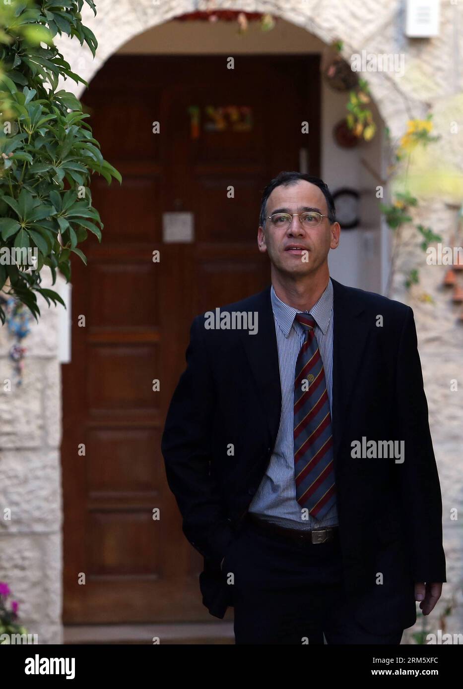 Bildnummer: 60732591  Datum: 19.11.2013  Copyright: imago/Xinhua (131119) -- JERUSALEM, Nov. 19, 2013 (Xinhua) -- Deputy Attorney General Shai Nitzan stands near his home in Jerusalem, on Nov. 19, 2013. A search panel appointed by the Israeli Justice Minister announced on Tuesday that Deputy Attorney General Shai Nitzan was selected as a candidate for the next state prosecutor, according to a statement released by the ministry. Nitzan, 54, was nominated alone with three other candidates. He told the Ynet news website that it is a great honor to be selected for the post. (Xinhua/JINI) MIDEAST-J Stock Photo