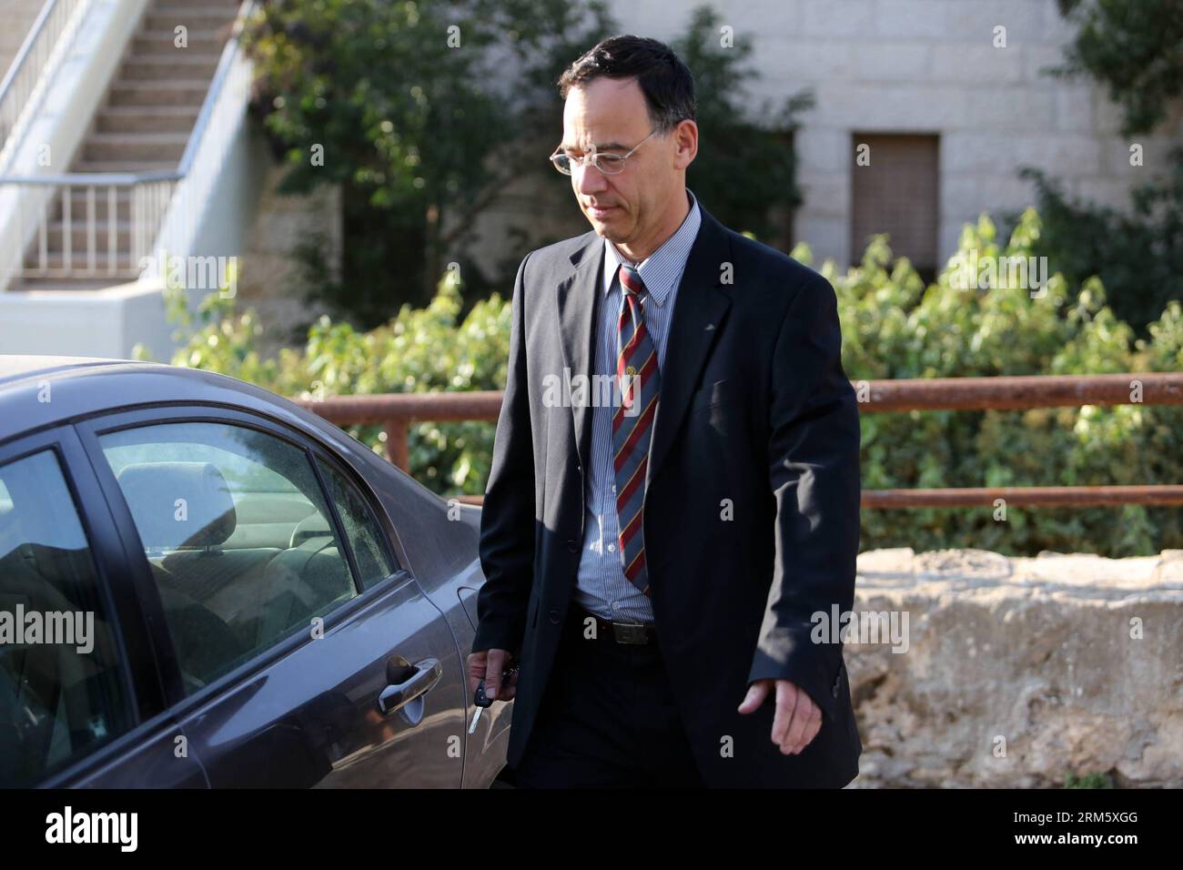 Bildnummer: 60732589  Datum: 19.11.2013  Copyright: imago/Xinhua (131119) -- JERUSALEM, Nov. 19, 2013 (Xinhua) -- Deputy Attorney General Shai Nitzan walks toward his car near his home in Jerusalem, on Nov. 19, 2013. A search panel appointed by the Israeli Justice Minister announced on Tuesday that Deputy Attorney General Shai Nitzan was selected as a candidate for the next state prosecutor, according to a statement released by the ministry. Nitzan, 54, was nominated alone with three other candidates. He told the Ynet news website that it is a great honor to be selected for the post. (Xinhua/J Stock Photo