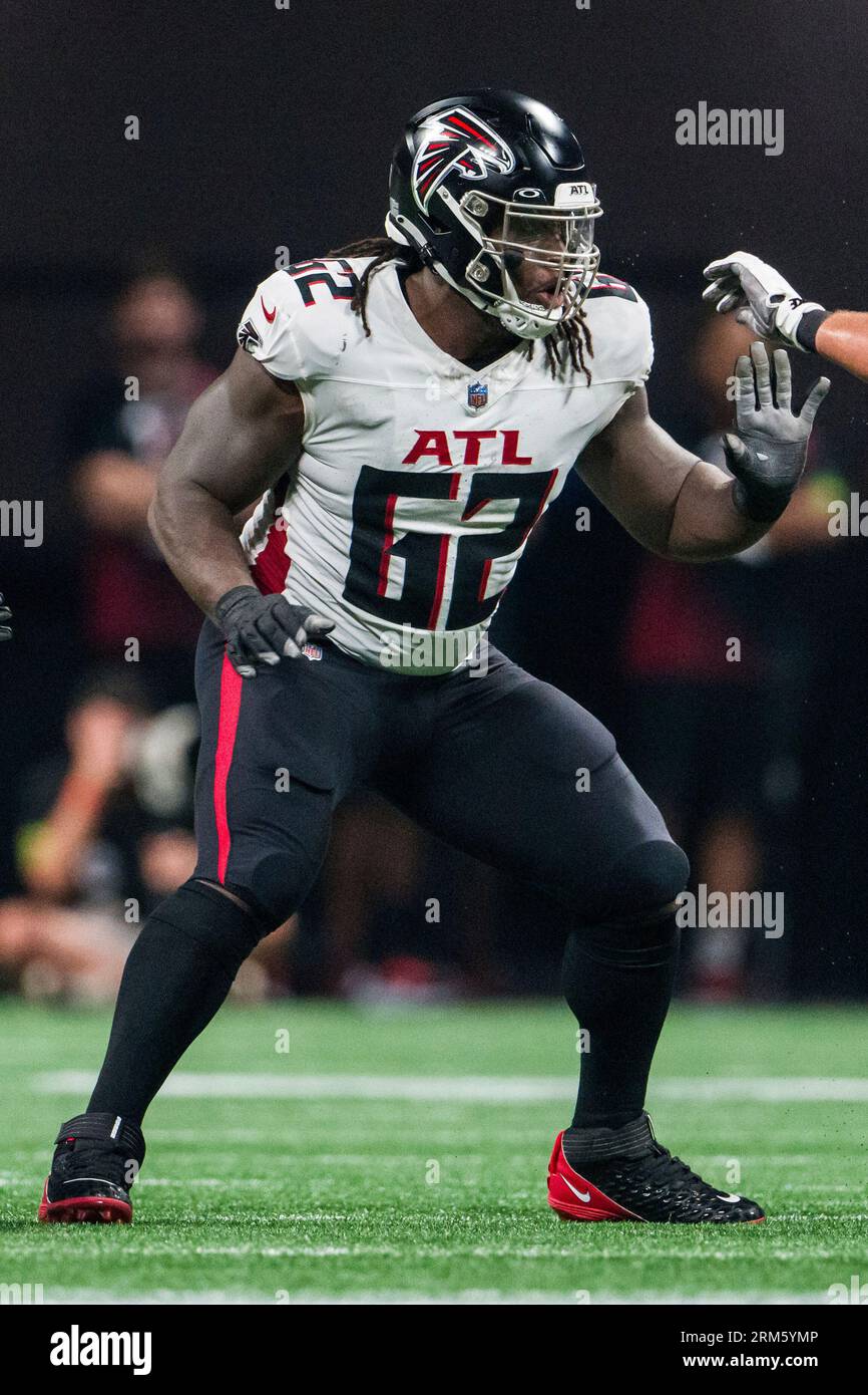 Atlanta Falcons offensive lineman Jonotthan Harrison (62) walks on the  sidelines during an NFL pre-season football game against the Miami  Dolphins, Friday, Aug. 11, 2023, in Miami Gardens, Fla. (AP Photo/Doug  Murray