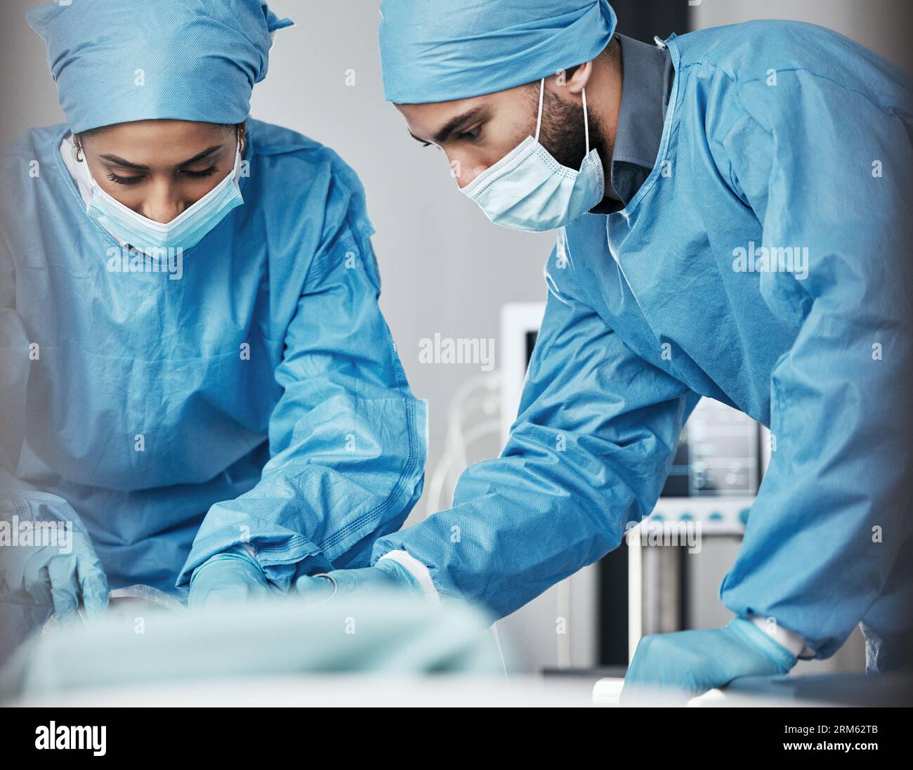 Doctors operation theater patient operation hi-res stock