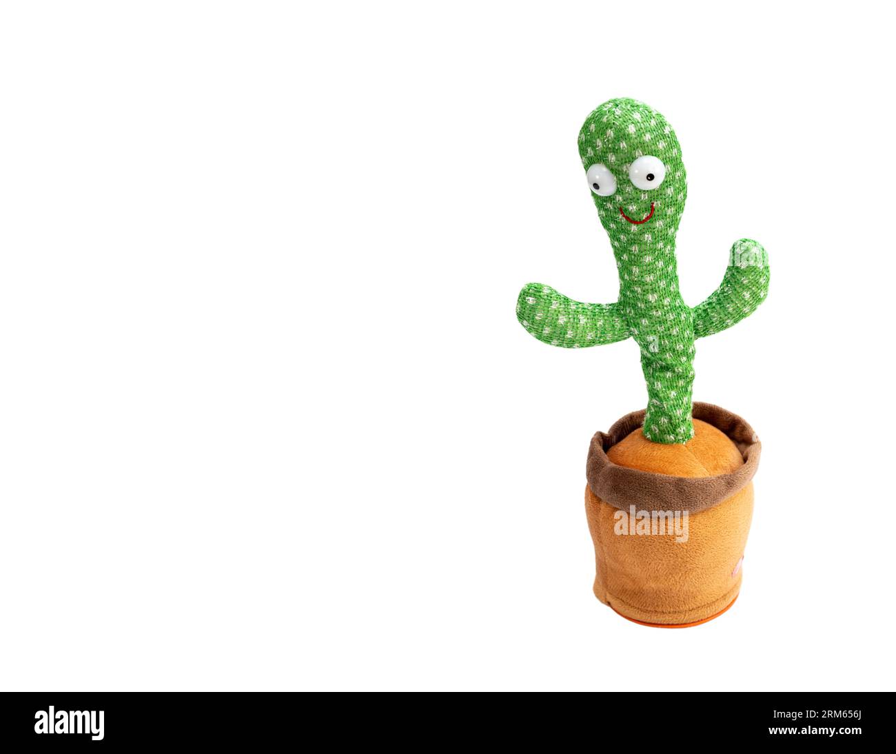 Dancing cactus children's toy with table back and music isolated on a white background with copy space. Stock Photo