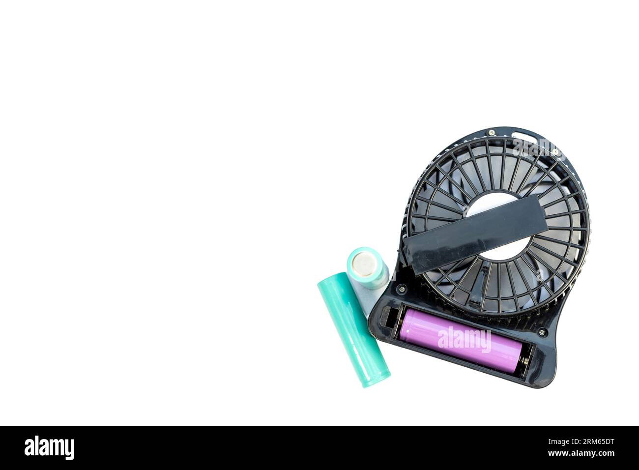 Changing battery of a small portable fan that runs on battery power