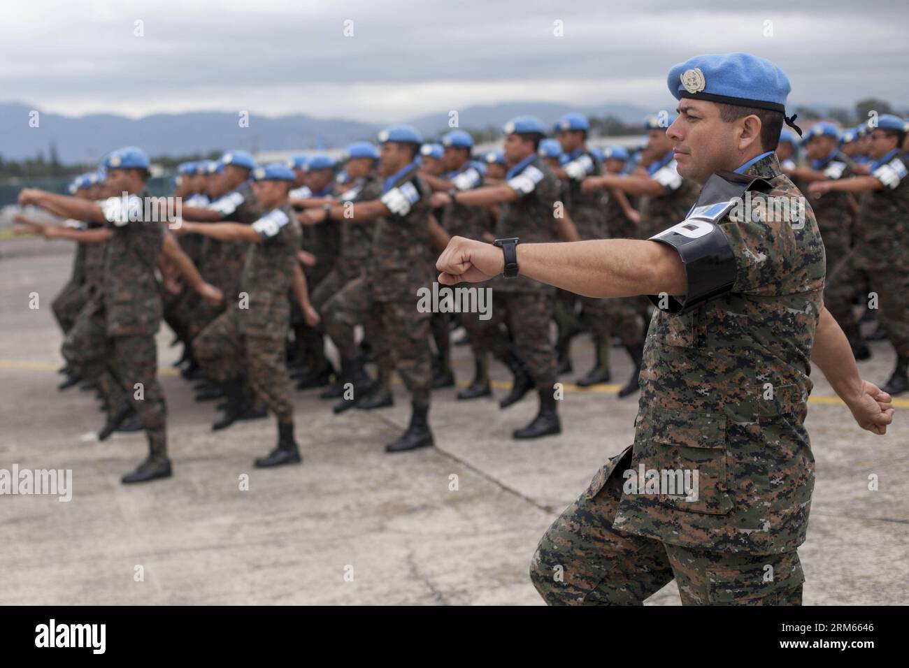 Bildnummer: 60815795  Datum: 10.12.2013  Copyright: imago/Xinhua     GUATEMALA CITY,  -- Soldiers of the United Nations Stabilization Mission in Haiti (MINUSTAH) of Guatemalan Army participate in a parade to commemorate the 92nd anniversary of the Guatemalan Air Force, in Guatemala City, capital of Guatemala, on Dec. 10, 2013. (Xinhua/Luis Echeverria) (rt) (ah) GUATEMALA-GUATEMALA CITY-MILITARY-CELEBRATION PUBLICATIONxNOTxINxCHN Militär Soldat xas x0x 2013 quer premiumd Stock Photo