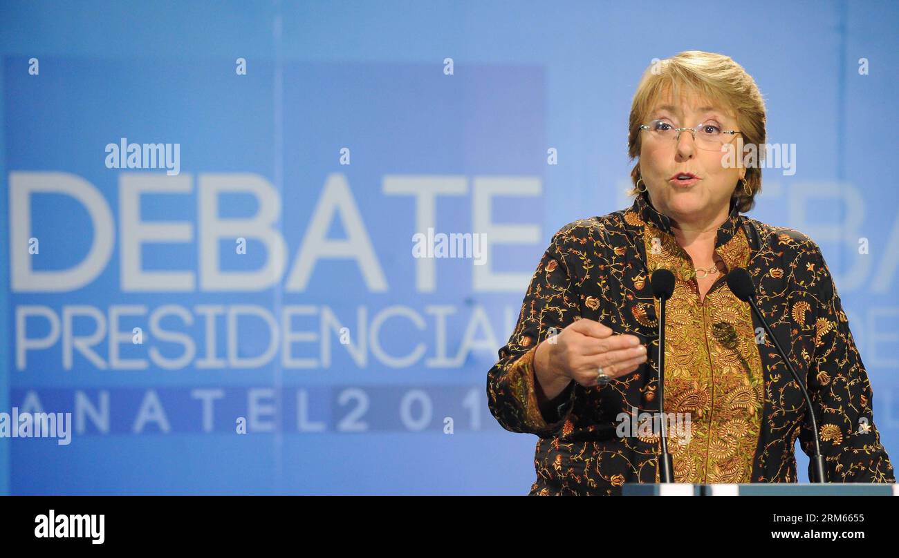 Bildnummer: 60815804  Datum: 10.12.2013  Copyright: imago/Xinhua     SANTIAGO, Dec. 10, 2013 -- The presidential candidate by electoral coalition New Majority Pact, Michelle Bachelet, delivers a speech in a TV discussion held by Television National Asociation (ANATEL), in the way for Chile s 2014 presidential elections, at TVN Channel facilities, in Santiago, capital of Chile, Dec. 10, 2013.   (Xinhua/Jorge Villegas) (rh) (da) CHILE-SANTIAGO-POLITICS-DEBATE PUBLICATIONxNOTxINxCHN Politik people Wahl Präsidentschaftswahl TV Duell xas x1x 2013 quer Aufmacher premiumd Stock Photo