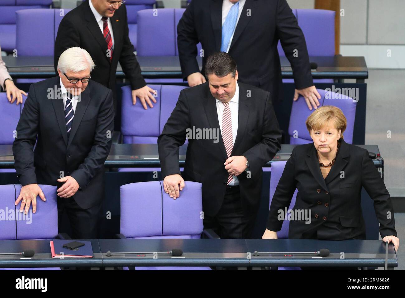 (131217) -- BERLIN, Dec. 17, 2013 (Xinhua) -- German Chancellor Angela Merkel (1st R Front) and German Vice-Chancellor and Minister of Economics and Energy Sigmar Gabriel attend the meeting of Bundestag, Germany s lower house of parliament, in Berlin, Germany on Dec. 17, 2013. German new government headed by Chancellor Angela Merkell was sworn into office on Tuesday to rule Europe s biggest economy for the next four years. Cabinet ministers of the new coalition government, are formed by Merkel s Christian Democratic Union (CDU), its Bavarian sister party Chrisitian Social Union (CSU), and the Stock Photo