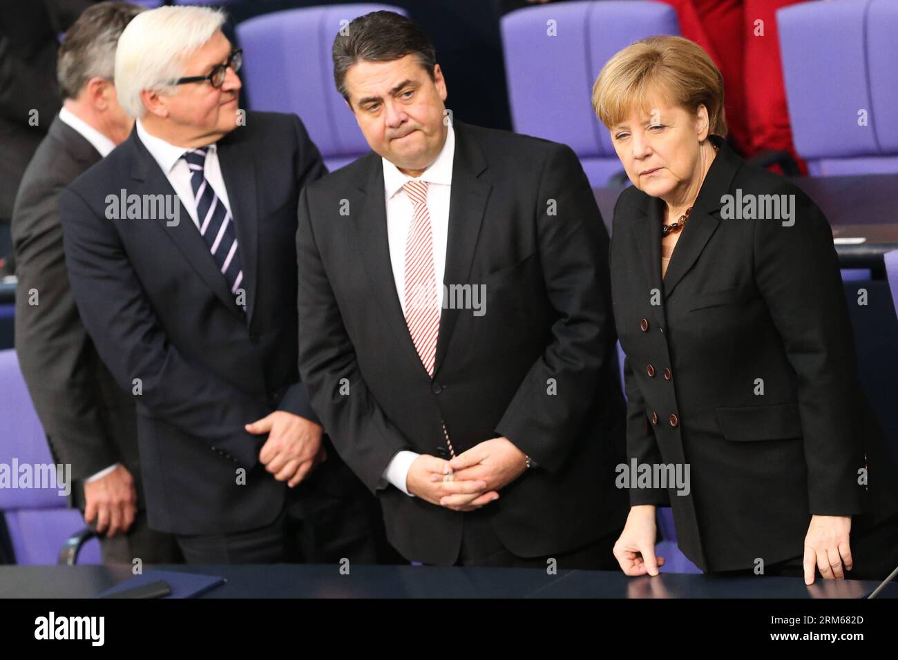 (131217) -- BERLIN, Dec. 17, 2013 (Xinhua) -- German Chancellor Angela Merkel (1st R) and German Vice-Chancellor and minister of economics and energy Sigmar Gabriel (2nd R) attend the meeting of Bundestag, Germany s lower house of parliament, in Berlin, Germany on Dec. 17, 2013. German new government headed by Chancellor Angela Merkel was sworn into office on Tuesday to rule Europe s biggest economy for the next four years. Cabinet ministers of the new coalition government, are formed by Merkel s Christian Democratic Union (CDU), its Bavarian sister party Chrisitian Social Union (CSU), and the Stock Photo