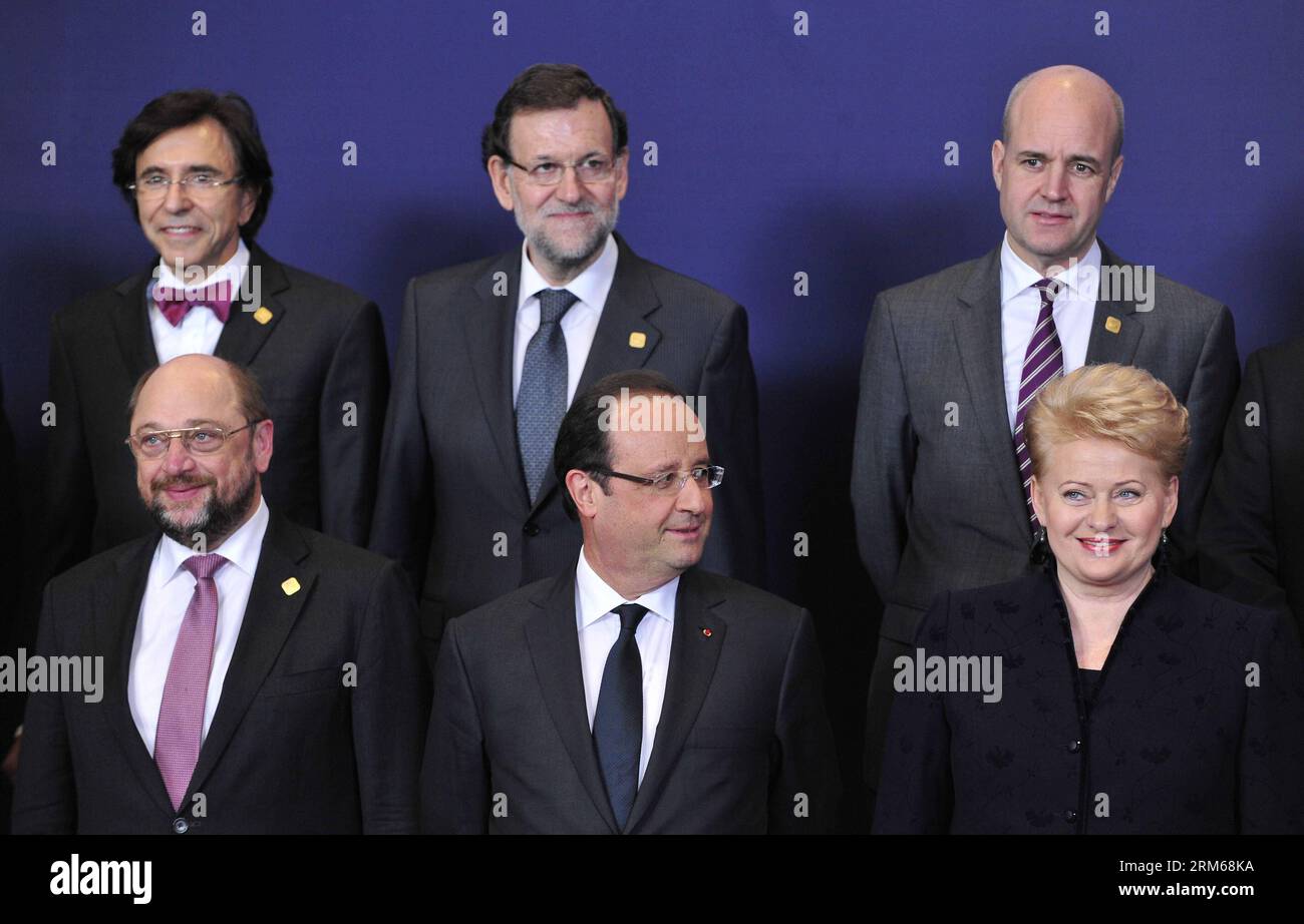 (131219) -- BRUSSELS, Dec. 19, 2013 (Xinhua) -- President of European Parliament Martin Schulz, French President Francois Hollande, Lithuanian President Dalia Grybauskaite (L-R, Down), Belgian Prime Minister Elio Di Rupo, Spanish Prime Minister Mariano Rajoy and Swedish Prime Minister Fredirk Reinfeldt (L-R, Up) attend the group photo session on the sidelines of the European Union (EU) Summit in Brussels, capital of Belgium, Dec. 19, 2013. European Union leaders convened in Brussels Thursday for a two-day summit with economy set to top the agenda. (Xinhua/Zhou Lei) BELGIUM-BRUSSELS-EU SUMMIT-G Stock Photo