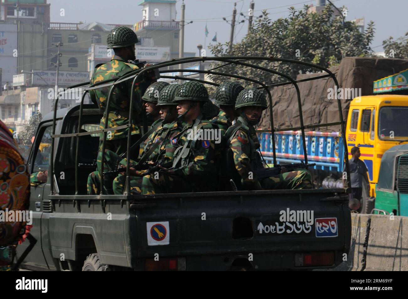 (131224) -- DHAKA, Dec. 24, 2013 (Xinhua) -- Bangladeshi Army personnel are deployed to maintain order during a four-day blockade in Dhaka, Bangladesh, Dec. 24, 2013. Bangladesh s main opposition has called a fresh four-day blockade from Saturday morning, demanding parliamentary polls under an interim non-party caretaker government. (Xinhua/Shariful Islam) BANGLADESH-DHAKA-PROTEST-BLOCKADE PUBLICATIONxNOTxINxCHN   Dhaka DEC 24 2013 XINHUA Bangladeshi Army Personnel are Deployed to maintain Order during a Four Day Blockade in Dhaka Bangladesh DEC 24 2013 Bangladesh S Main Opposition has called Stock Photo