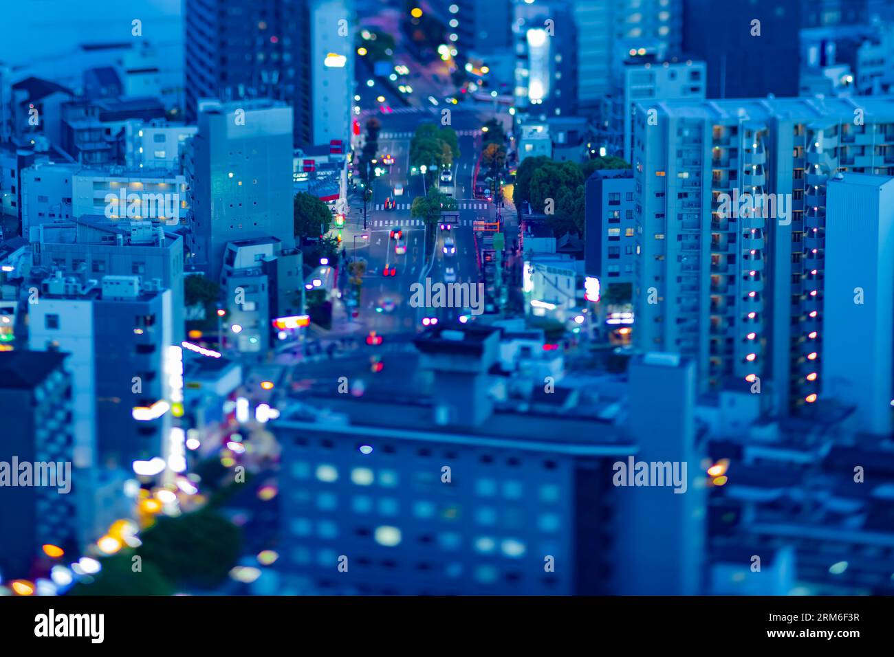 A dusk miniature cityscape by high angle view at the urban street in ...