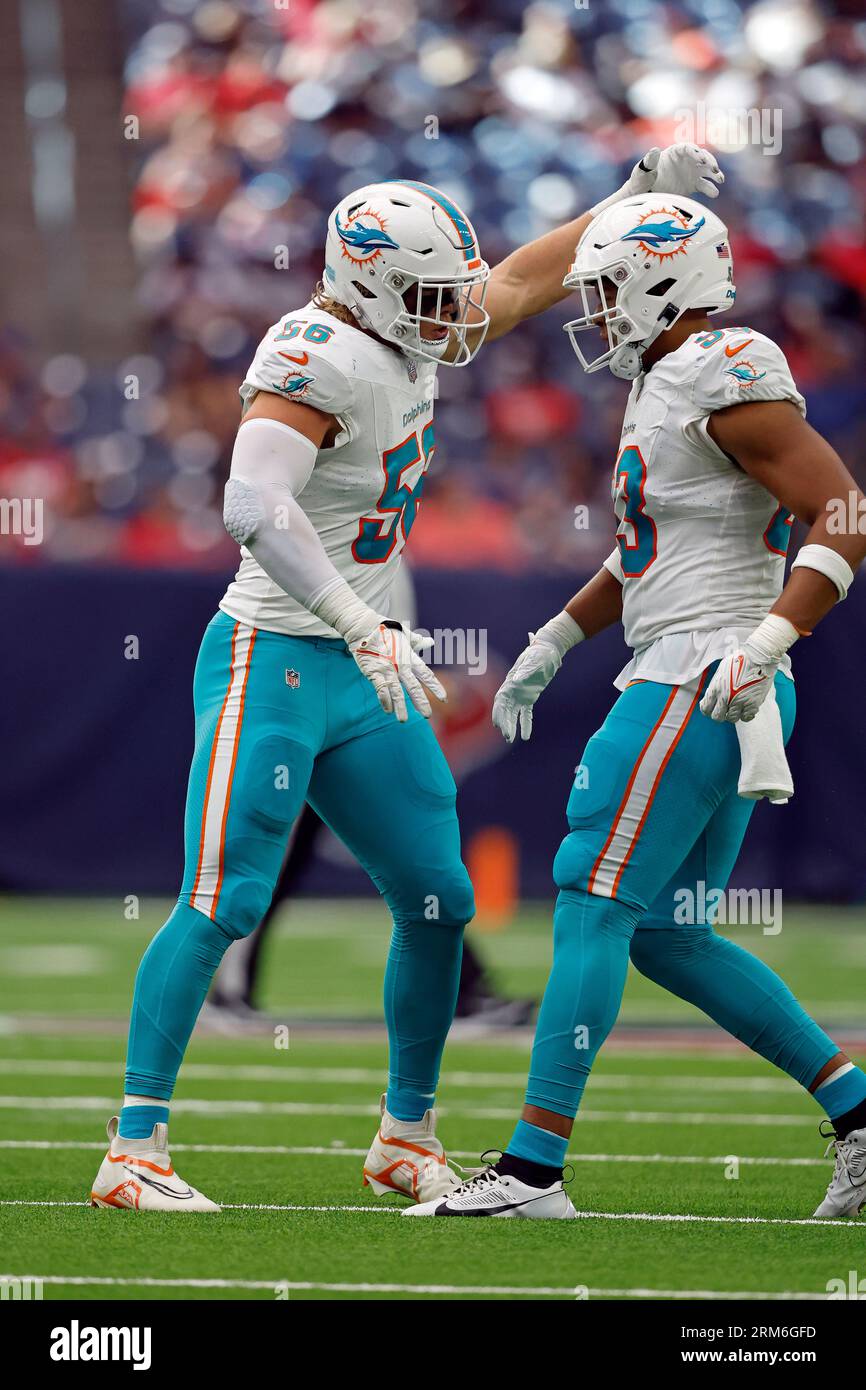 Miami Dolphins defensive tackle Brandon Pili (96) celebrates after making a  tackle during the second half of a preseason NFL football game against the  Atlanta Falcons, Friday, Aug. 11, 2023, in Miami