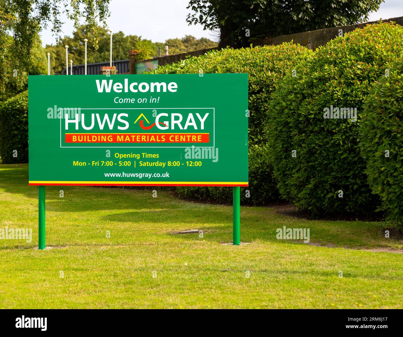 Sign for Huws Gray building materials centre,  Martlesham, Ipswich, Suffolk, UK  builders merchant chain business Stock Photo