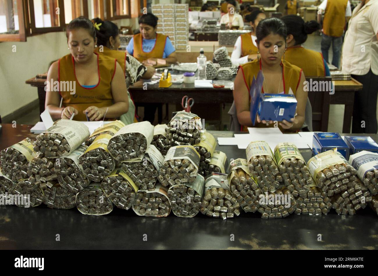 Women work at a cigar factory in Esteli, 140 km north of Managua, capital  of Nicaragua, on Jan. 17, 2014. The tobacco industry in Nicaragua has grown  fast in recent years, reporting