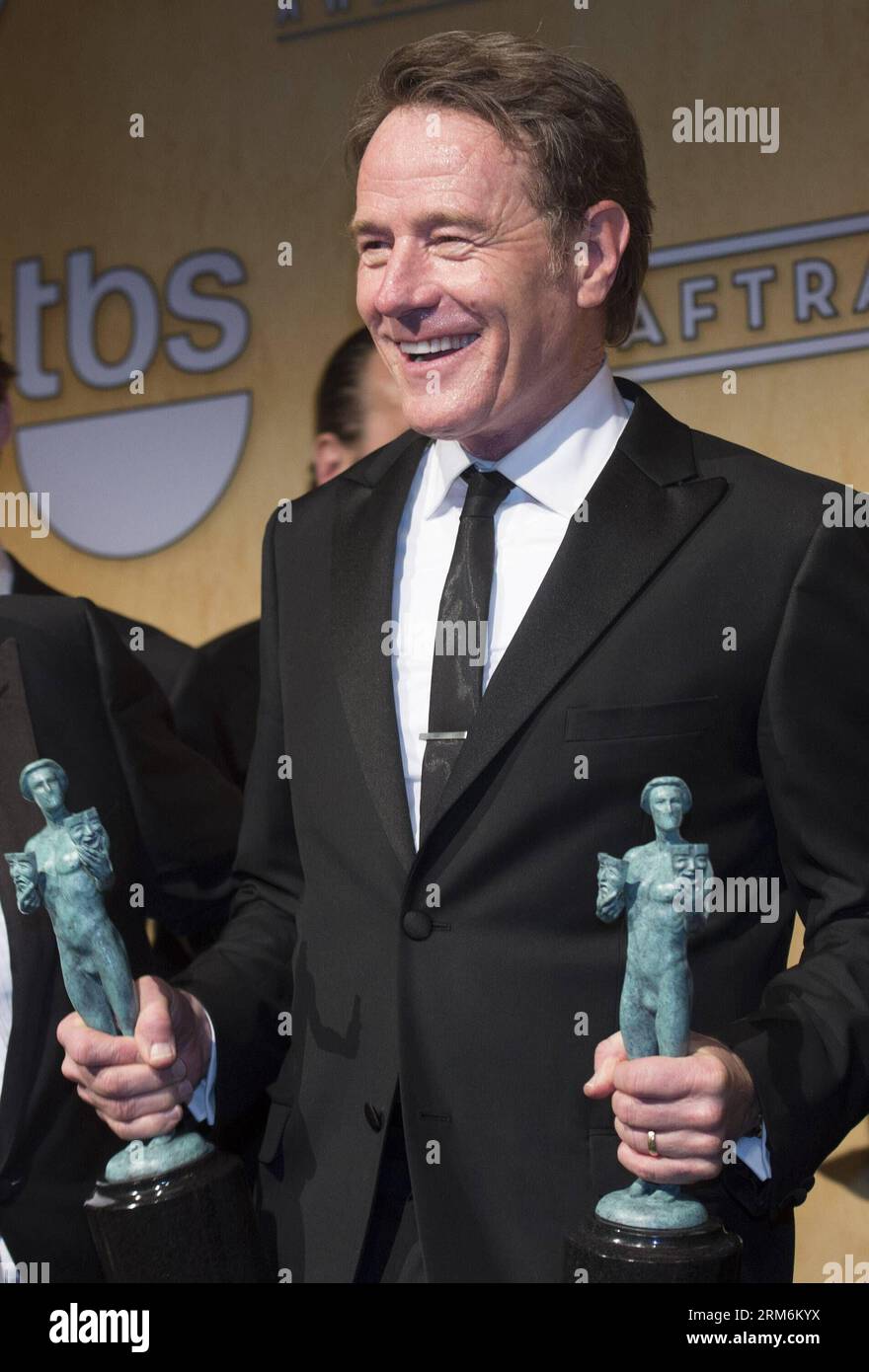 Bryan Cranston, winner of the Outstanding Performance By An Ensemble In A Drama Series award for Breaking Bad , poses in the press room during the 20th Annual Screen Actors Guild Awards, at the Shrine Auditorium in Los Angeles, California, the United States, Jan. 18, 2014. (Xinhua/Yang Lei)(ctt) U.S.-LOS ANGELES-SAG AWARDS PUBLICATIONxNOTxINxCHN   Bryan Cranston Winner of The Outstanding Performance by to Ensemble in a Drama Series Award for Breaking Bath Poses in The Press Room during The 20th Annual Screen Actors Guild Awards AT The Shrine Auditorium in Los Angeles California The United Stat Stock Photo