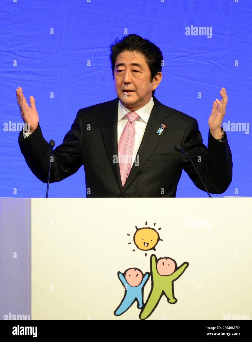 (140119) -- TOKYO, Jan. 19, 2014 (Xinhua) -- Shinzo Abe, Japanese Prime Minister and leader of the Liberal Democratic Party (LDP), speaks during the annual convention of the LDP in Tokyo, Japan, on Jan. 19, 2014. Japanese Prime Minister Shinzo Abe vowed Sunday to recover the country s economy by defeating prolonged deflation and create a virtuous cycle that would lead to wage increases. (Xinhua/Ma Ping) (srb) JAPAN-TOKYO-POLITICS-LDP-CONVENTION PUBLICATIONxNOTxINxCHN   Tokyo Jan 19 2014 XINHUA Shinzo ABE Japanese Prime Ministers and Leader of The Liberal Democratic Party LDP Speaks during The Stock Photo