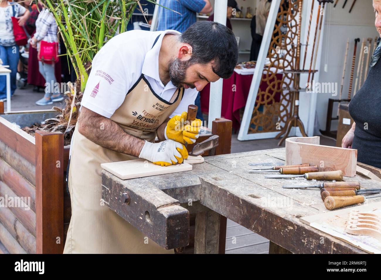 ISTANBUL, TURKEY - SEPTEMBER 10, 2017: An unidentified carpenter makes his product visible at the Folk Art Festival. Stock Photo