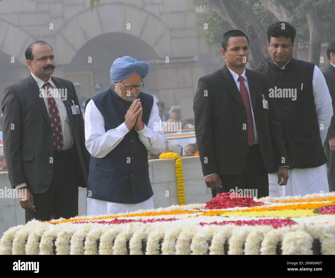 (140130) -- NEW DELHI, Jan. 30, 2014 (Xinhua) -- Indian Prime Minister Manmohan Singh pays tributes at Mahatma Gandhi s memorial in Rajghat, New Delhi of India, Jan. 30, 2014. Gandhi was assassinated on January 30, 1948, while he was walking to a platform from which he was to address a prayer meeting. (Xinhua/Partha Sarkar) INDIA-NEW DELHI-GANDHI-ANNIVERSARY PUBLICATIONxNOTxINxCHN   New Delhi Jan 30 2014 XINHUA Indian Prime Ministers Manmohan Singh Pays Tributes AT Mahatma Gandhi S Memorial in Rajghat New Delhi of India Jan 30 2014 Gandhi what assassinated ON January 30 1948 while he what Walk Stock Photo