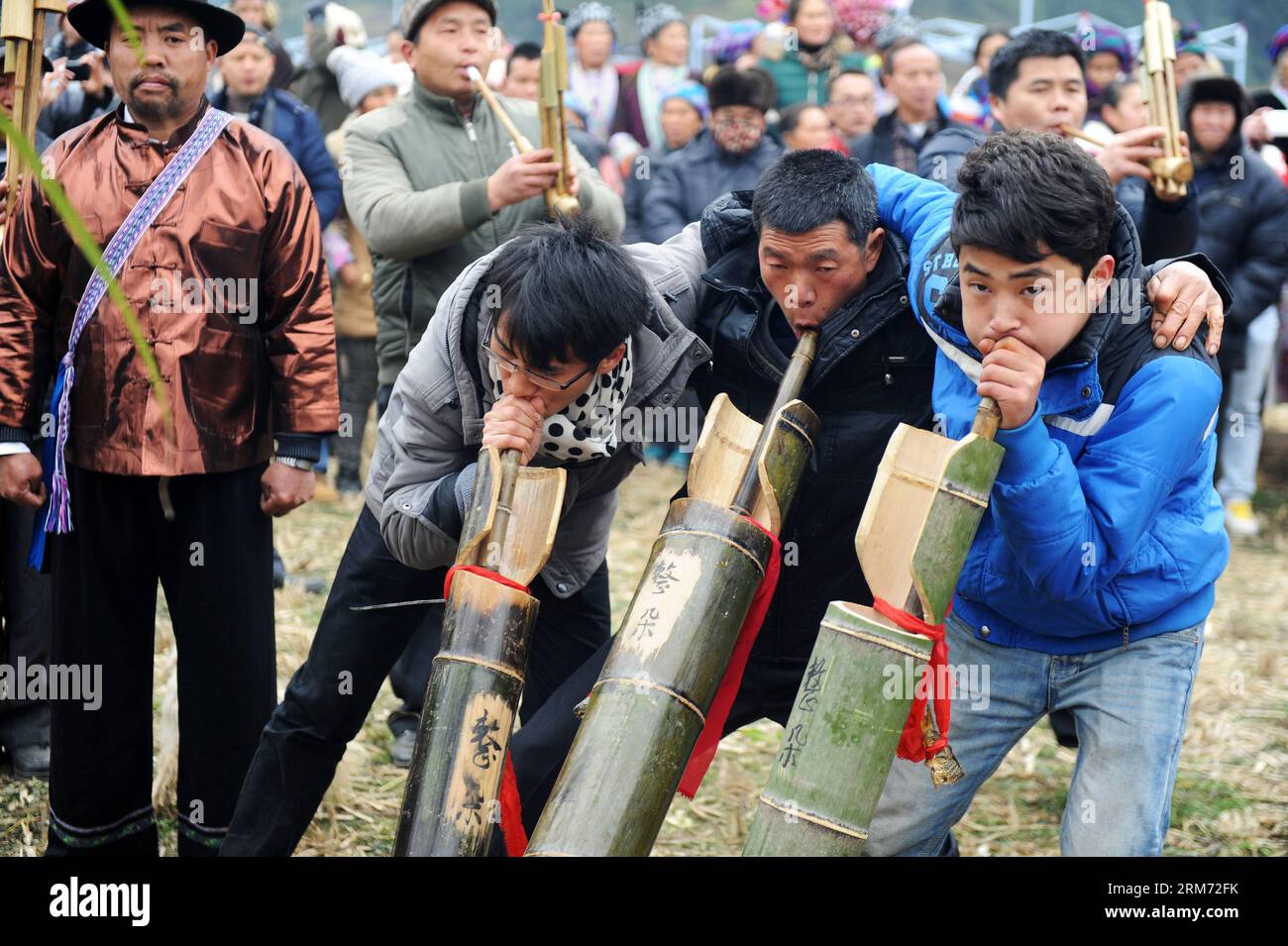 (140211) -- RONGSHUI, Feb. 10, 2014 (Xinhua) -- Villagers blow reed-pipe wind instrument at the Pohui , a big party event participated by local people to celebrate Chinese lunar new year, in Yuanbao Village of Antai Township, Rongshui Miao Autonomous County, south China s Guangxi Zhuang Autonomous Region, Feb. 10, 2014. The Pohui , which has a history of more than 100 years, is annually held from the first day to the 17th day of the first month on the Chinese lunar calendar. (Xinhua/Li Bin) (lfj) CHINA-GUANGXI-RONGSHUI-MIAO ETHNIC GROUP-CELEBRATIONS (CN) PUBLICATIONxNOTxINxCHN   Rongshui Feb 1 Stock Photo