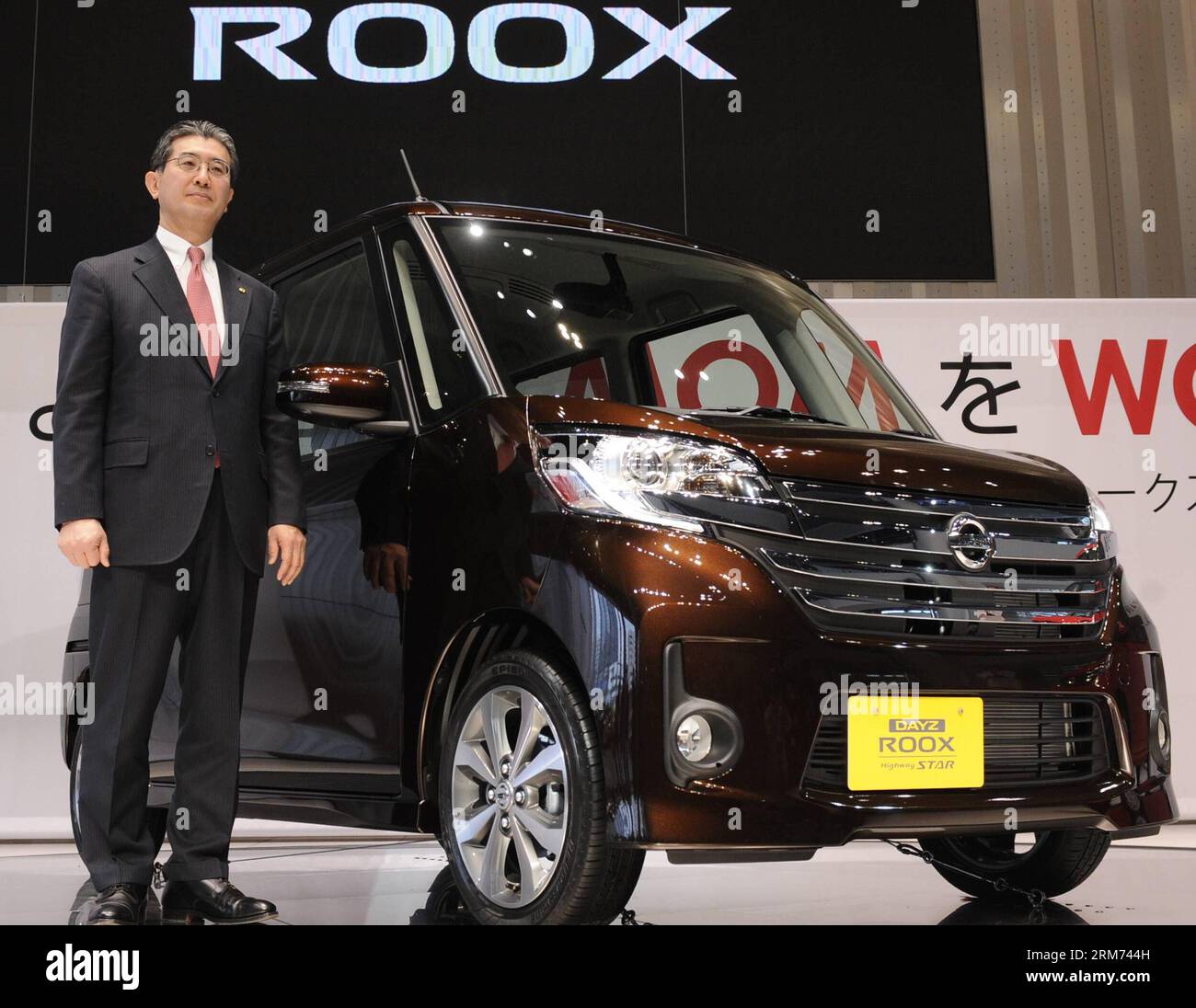 (140213) -- YOKOHAMA, Feb. 13, 2014 (Xinhua) -- Japan s auto giant Nissan s Vice President Takao Katagiri stands by Nissan s new model Dayz Roox at the headquarters of Nissan Motor in Yokohama, Japan, Feb. 13, 2014. Nissan s Dayz Roox was released on Thursday throughout Japan. (Xinhua/Stringer) JAPAN-YOKOHAMA-AUTO-NISSAN-NEW CAR PUBLICATIONxNOTxINxCHN   Yokohama Feb 13 2014 XINHUA Japan S Car Giant Nissan S Vice President Takao Katagiri stands by Nissan S New Model   AT The Headquarters of Nissan Engine in Yokohama Japan Feb 13 2014 Nissan S   what released ON Thursday throughout Japan XINHUA Stock Photo