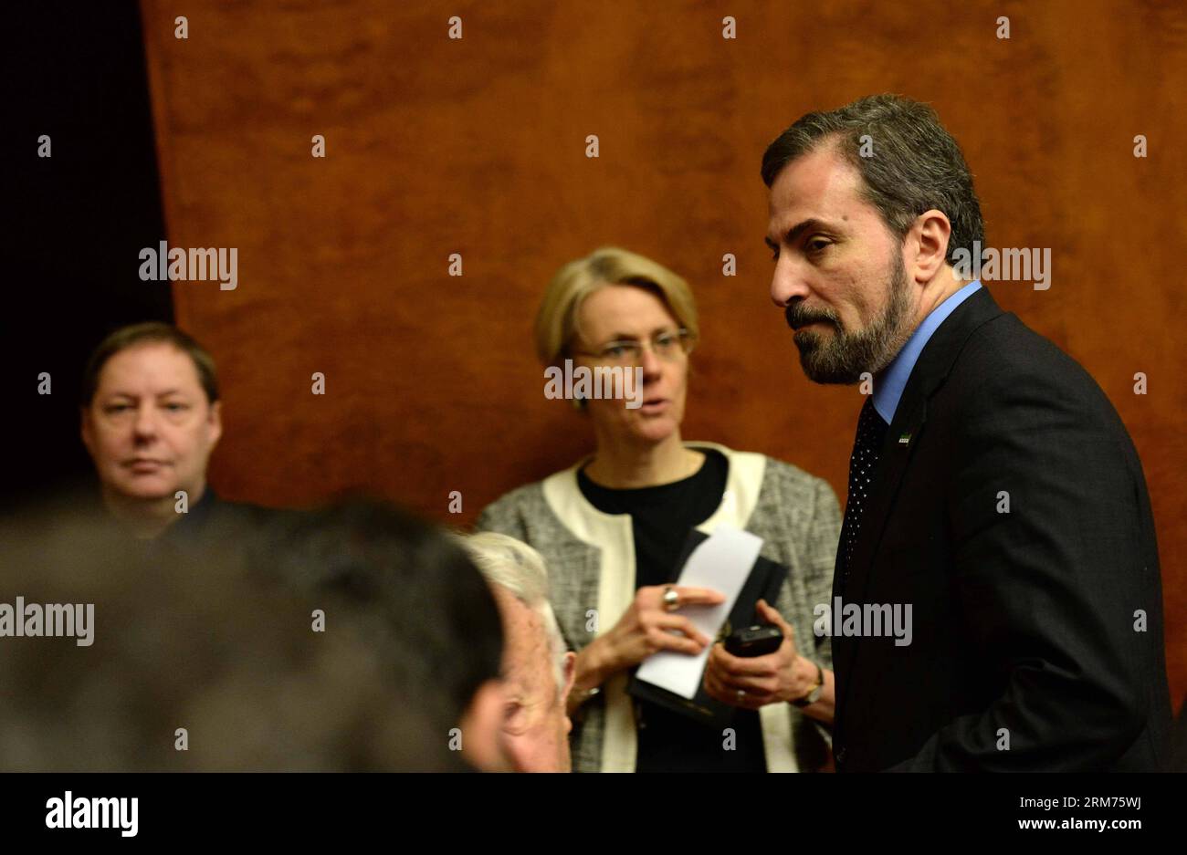 (140214) -- GENEVA, Feb. 14, 2014 (Xinhua) -- Louay al-Safi (1st R), spokesman of the opposition delegation, attends a press conference in Geneva, Switzerland, Feb.14, 2014. Delegates of Syrian government and the opposition both admitted on Friday that the second round of the Geneva II conference failed to achieve any progress. (Xinhua/Wang Siwei) SWITZERLAND-GENEVA-SYRIA-GENEVA II PUBLICATIONxNOTxINxCHN   Geneva Feb 14 2014 XINHUA  Al Safi 1st r spokesman of The Opposition Delegation Attends a Press Conference in Geneva Switzerland Feb 14 2014 Delegates of Syrian Government and The Opposition Stock Photo