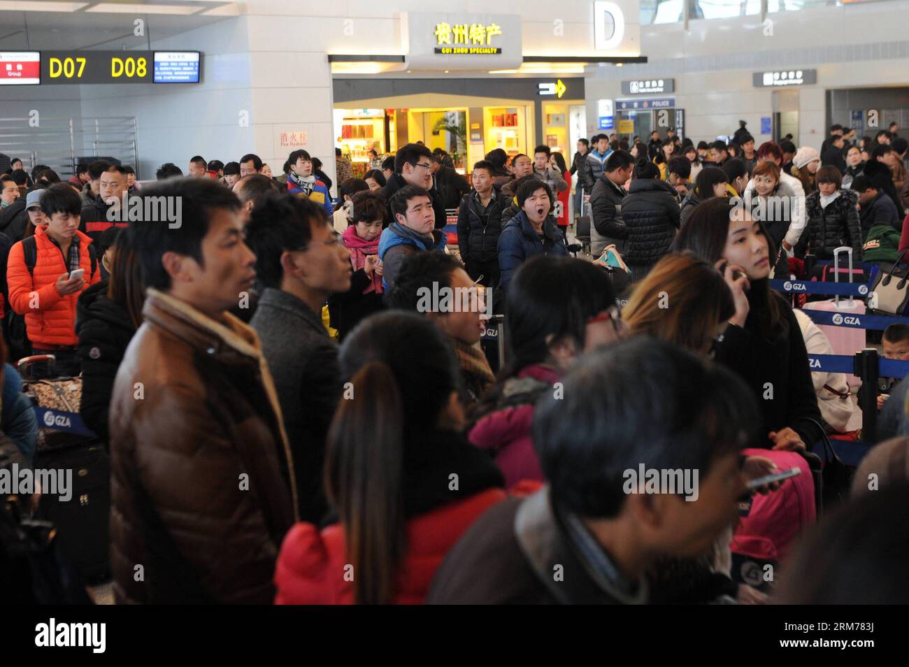 (140218) -- GUIYANG, Feb. 18, 2014 (Xinhua) -- Passengers are stranded at Longdongbao International Airport in Guiyang, capital of southwest China s Guizhou Province, Feb. 18, 2013. Heavy snow led to temporary closure of the airport at 8 a.m. Tuesday for snow and ice removal. More than 90 flights were canceled and over 4,800 passengers were affected before the airport was reopened at noon. (Xinhua/Tao Liang)(wjq) CHINA-GUIZHOU-SNOW-AIRPORT CLOSURE (CN) PUBLICATIONxNOTxINxCHN   Guiyang Feb 18 2014 XINHUA Passengers are stranded AT Longdongbao International Airport in Guiyang Capital of Southwes Stock Photo