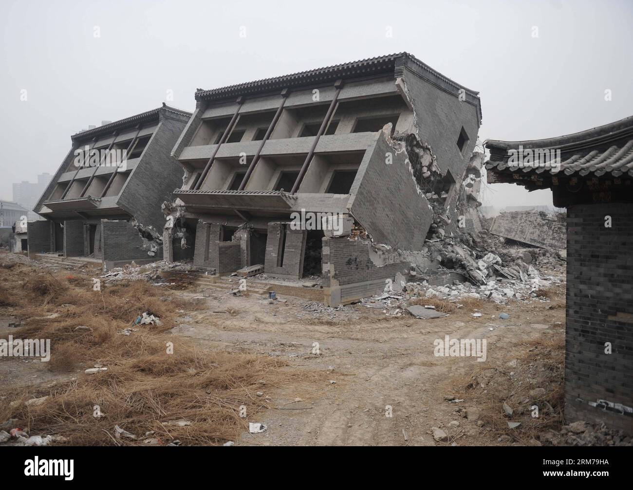 (140220) -- BEIJING, Feb. 20, 2014 (Xinhua) -- Illegal houses are demolished in Zhenggezhuang Village, Beiqijia Township of Changping District on the outskirt of Beijing, China, Feb. 20, 2014. Those illegal houses cover an area of 108.55 mu (about 7.24 hectares) , which will be used for tree planting after complete of demolition. (Xinhua/Luo Xiaoguang) (hdt) CHINA-BEIJING-CHANGPING-ILLEGAL HOUSES-DEMOLITION (CN) PUBLICATIONxNOTxINxCHN   Beijing Feb 20 2014 XINHUA illegal Houses are Demolished in  Village  Township of Chang Ping District ON The outskirts of Beijing China Feb 20 2014 Those illeg Stock Photo