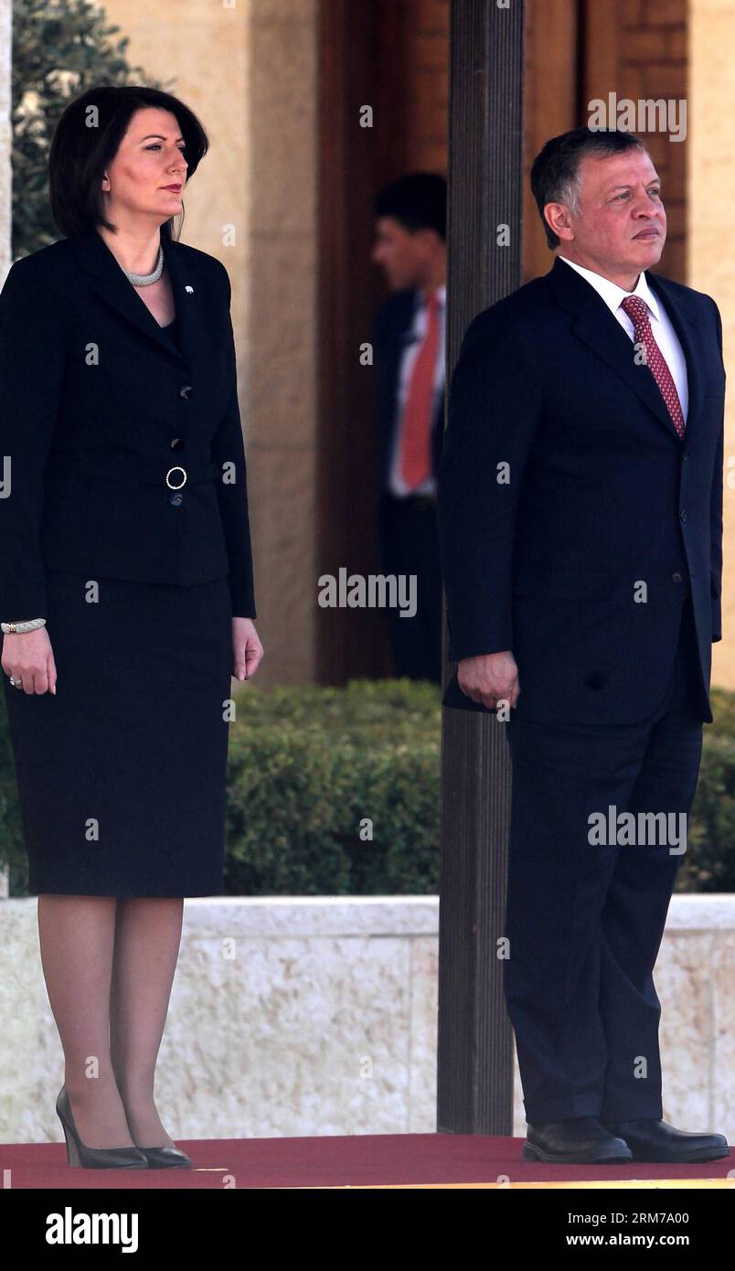 (140220) -- AMMAN, Feb. 20, 2014 (Xinhua) -- Jordan s King Abdullah II (R) and Kosovo President Atifete Jahjaga (L) review the honor guard upon her arrival at the royal palace in Amman, capital of Jordan on Feb. 20, 2014. Jahjaga is on an official visit to the Kingdom. (Xinhua/Mohammad Abu Ghosh) JORDAN-AMMAN-KOSOVO-PRESIDENT-VISIT PUBLICATIONxNOTxINxCHN   Amman Feb 20 2014 XINHUA Jordan S King Abdullah II r and Kosovo President Atifete Jahjaga l REVIEW The HONOR Guard UPON her Arrival AT The Royal Palace in Amman Capital of Jordan ON Feb 20 2014 Jahjaga IS ON to Official Visit to The Kingdom Stock Photo