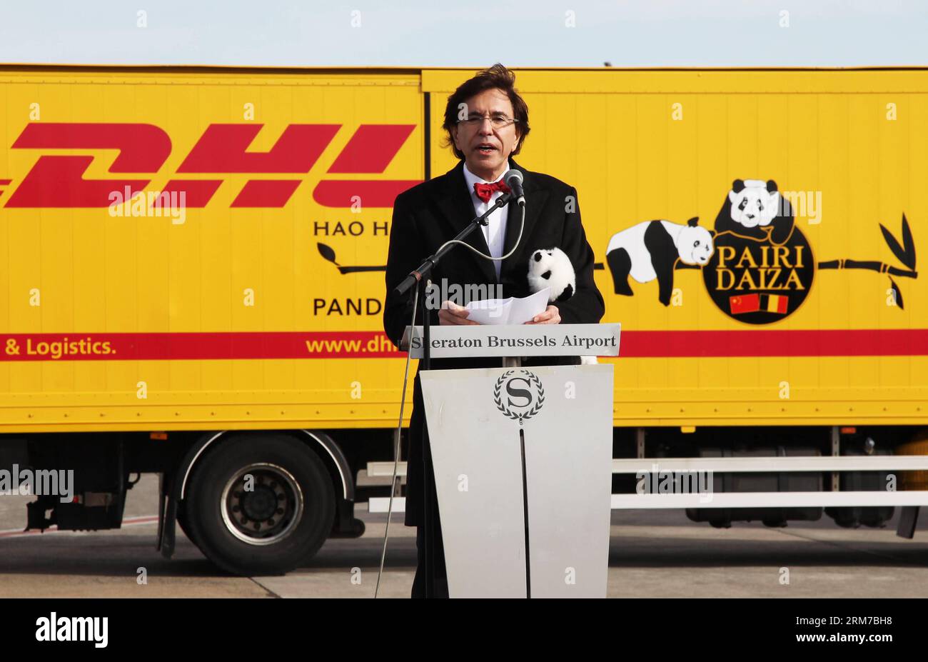 (140223) -- BRUSSELS, Feb. 23, 2014 (Xinhua) -- Belgian Prime Minister Elio Di Rupo speaks during the welcoming ceremony for the two giant pandas Xing Hui and Hao Hao at the Brussels National Airport in the capital of Belgium on Feb. 23, 2014. The pair of giant pandas, Xing Hui, the male, and Hao Hao, the female, arrived in Belgium Sunday, on lease from their breeding center in southwest China s Sichuan Province. They are both four years old and will stay in Belgium for the next 15 years. (Xinhua/Sun Wen) (lyx) BELGIUM-BRUSSELS-CHINA-GIANT PANDAS-ARRIVAL PUBLICATIONxNOTxINxCHN   Brussels Feb 2 Stock Photo