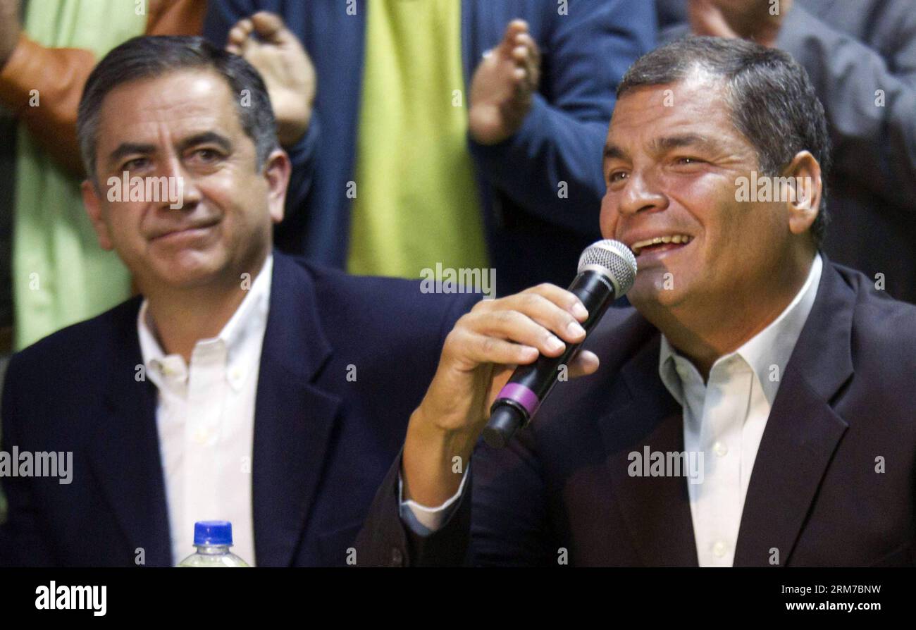 Ecuador s President Rafael Correa (R) and the candidate for the reelection to the Quito s Mayoralty, Augusto Barrera (L), react after receiving the results of the provincial and municipal election, at the headquarters of the Pais Alliance party, in the city of Quito, capital of Ecuador, on Feb. 23, 2014. The opposition candidate Mauricio Rodas won the election for the Quito s Mayoralty, according to local press. (Xinhua/Santiago Armas) (fnc) (ah) ECUADOR-QUITO-POLITICS-ELECTION PUBLICATIONxNOTxINxCHN   Ecuador S President Rafael Correa r and The Candidate for The REELECTION to The Quito S mayo Stock Photo