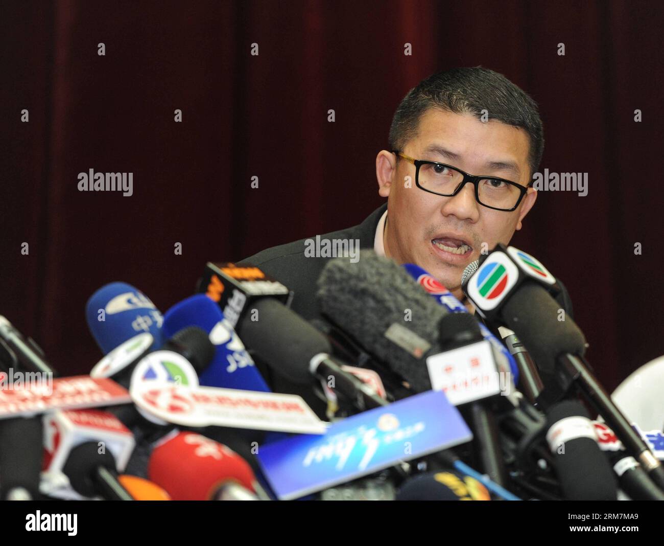Ignatius Ong Ming Choy, representative of the Malaysia Airlines, speaks during the press conference in Beijing on missing flight MH 370 on March 9, 2014. (Xinhua/Luo Xiaoguang) CHINA-BEIJING-MALAYSIAN AIRLINES-PRESS (CN) PUBLICATIONxNOTxINxCHN   Ignatius Ong Ming Choy Representative of The Malaysia Airlines Speaks during The Press Conference in Beijing ON Missing Flight MH 370 ON March 9 2014 XINHUA Luo Xiaoguang China Beijing Malaysian Airlines Press CN PUBLICATIONxNOTxINxCHN Stock Photo