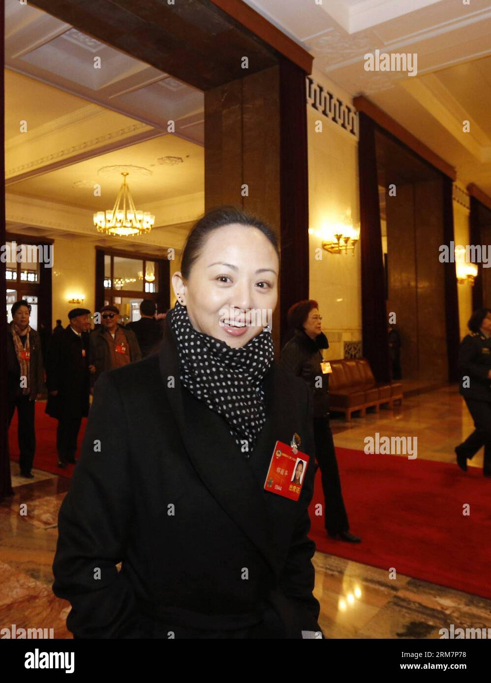 (140312) -- BEIJING, March 12, 2014 (Xinhua) -- Dancer Tai Lihua, member of the 12th National Committee of the Chinese People s Political Consultative Conference (CPPCC), arrives at the Great Hall of the People before the closing meeting of the second session of the 12th CPPCC National Committee in Beijing, capital of China, March 12, 2014. (Xinhua/Zhang Yuwei) (zkr) (TWO SESSIONS) CHINA-BEIJING-CPPCC-CLOSING MEETING (CN) PUBLICATIONxNOTxINxCHN   Beijing March 12 2014 XINHUA Dancer Tai Lihua member of The 12th National Committee of The Chinese Celebrities S Political Consultative Conference CP Stock Photo