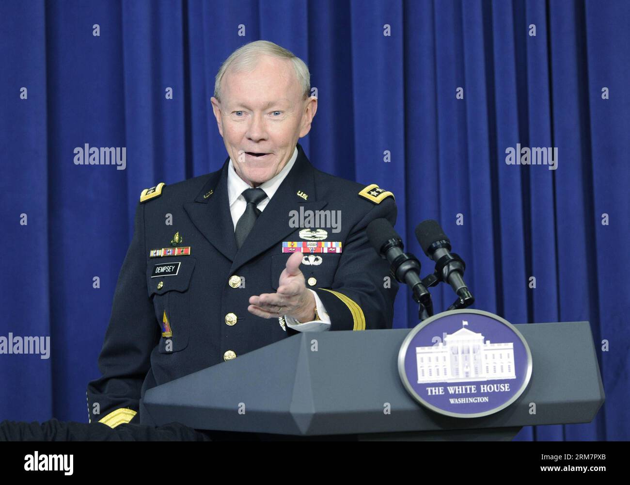 (140312) -- WASHINGTON D.C., March 12, 2014 (Xinhua) -- Chairman of the Joint Chiefs of Staff General Martin Dempsey speaks at a special screening of Disney s movie Muppets Most Wanted at the White House in Washington D.C., capital of the United States, March 12, 2014. As part of the Joining Forces initiative, U.S. First Lady Michelle Obama delivered remarks to children of military families during the special screening. (Xinhua/Bao Dandan) US-WASHINGTON-FIRST LADY-DISNEY-SCREENING PUBLICATIONxNOTxINxCHN   Washington D C March 12 2014 XINHUA Chairman of The Joint CHIEFS of Staff General Martin Stock Photo
