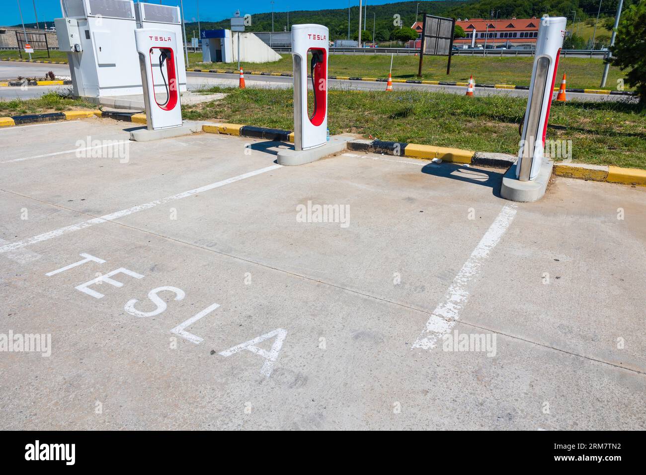 Tesla car or EV charging station near the highway. Bolu Turkiye - 7.30. ...