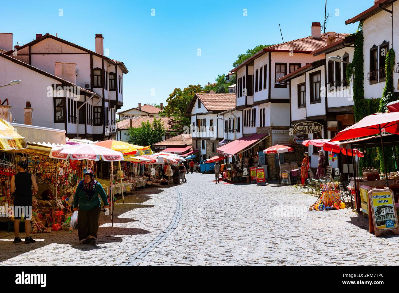 Shops and handmade food stalls in a street of Beypazari. Ankara Turkiye - 8.5.2023 Stock Photo