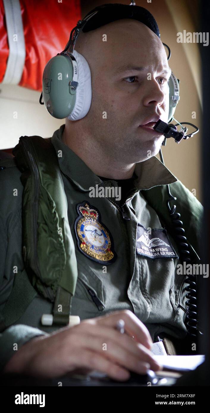 (140318) -- MELBOURNE, March 18, 2014 (Xinhua) -- Undated photo released by Australian Defense Force shows a crew member of the Australian RAAF AP3C Orion aircraft conducting search operations. The Australian Maritime Safety Authority (AMSA) said on Tuesday that Australia has begun the search operation for missing Malaysia Airline Flight MH370 in an area of 600,000 square kilometers off Western Australian coast. (Xinhua) (djj) AUSTRALIA-MELBOURNE-MISSING MALAYSIAN PLANE-SEARCH PUBLICATIONxNOTxINxCHN   Melbourne March 18 2014 XINHUA undated Photo released by Australian Defense Force Shows a Cre Stock Photo