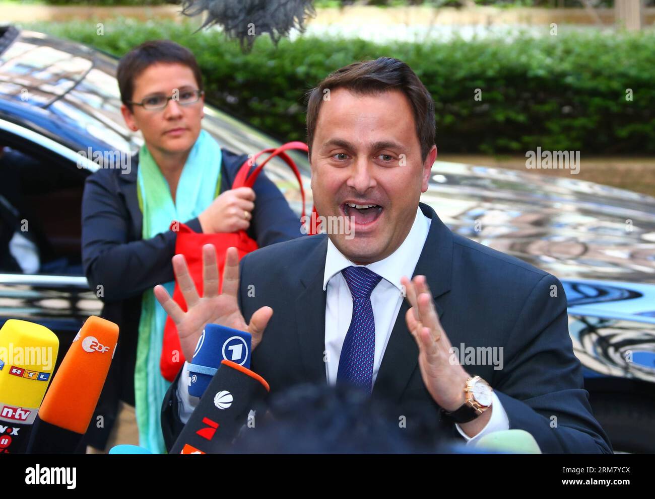 (140320) -- BRUSSELS, March 20, 2014 (Xinhua) --Luxembourg s Prime Minister Xavier Bettel speaks to media before the European Union (EU) Summit at the EU headquarters in Brussels, capital of Belgium, March 20, 2014. The EU spring summit will focus on industrial competitiveness, Ukraine and the bloc s energy strategy. (Xinhua/Gong Bing)(zl) BELGIUM-BRUSSELS-EU-SUMMIT-UKRAINE PUBLICATIONxNOTxINxCHN   Brussels March 20 2014 XINHUA Luxembourg S Prime Ministers Xavier Bettel Speaks to Media Before The European Union EU Summit AT The EU Headquarters in Brussels Capital of Belgium March 20 2014 The E Stock Photo
