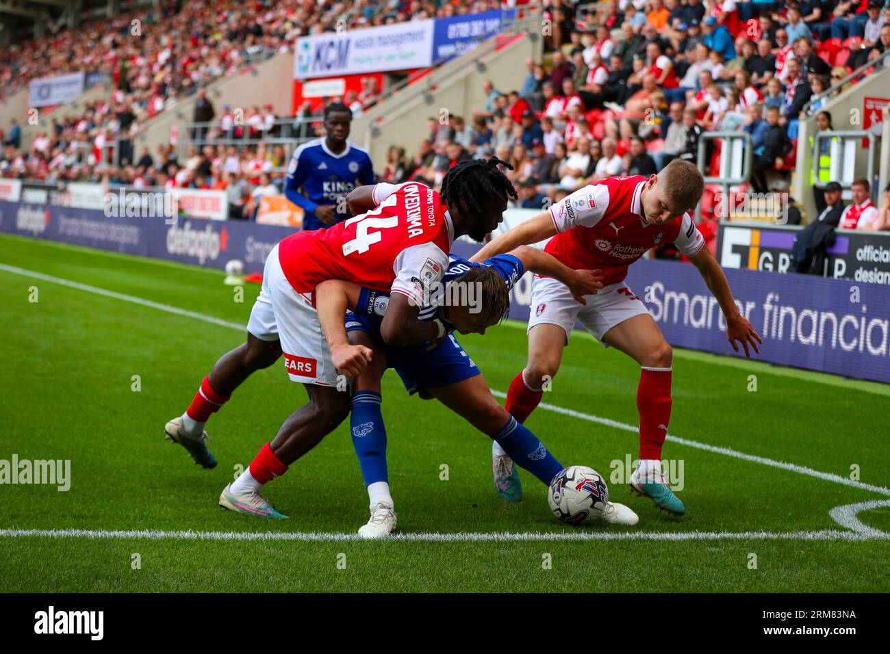 AESSEAL New York Stadium, Rotherham, England - 26th August 2023 Callum Doyle (5) of Leicester City shields the ball from Fred Onyedinma (14) of Rotherham United and Ciaran McGuckin (35) of Rotherham United - during the game Rotherham United v Leicester City, Sky Bet Championship,  2023/24, AESSEAL New York Stadium, Rotherham, England - 26th August 2023 Credit: Mathew Marsden/WhiteRosePhotos/Alamy Live News Stock Photo