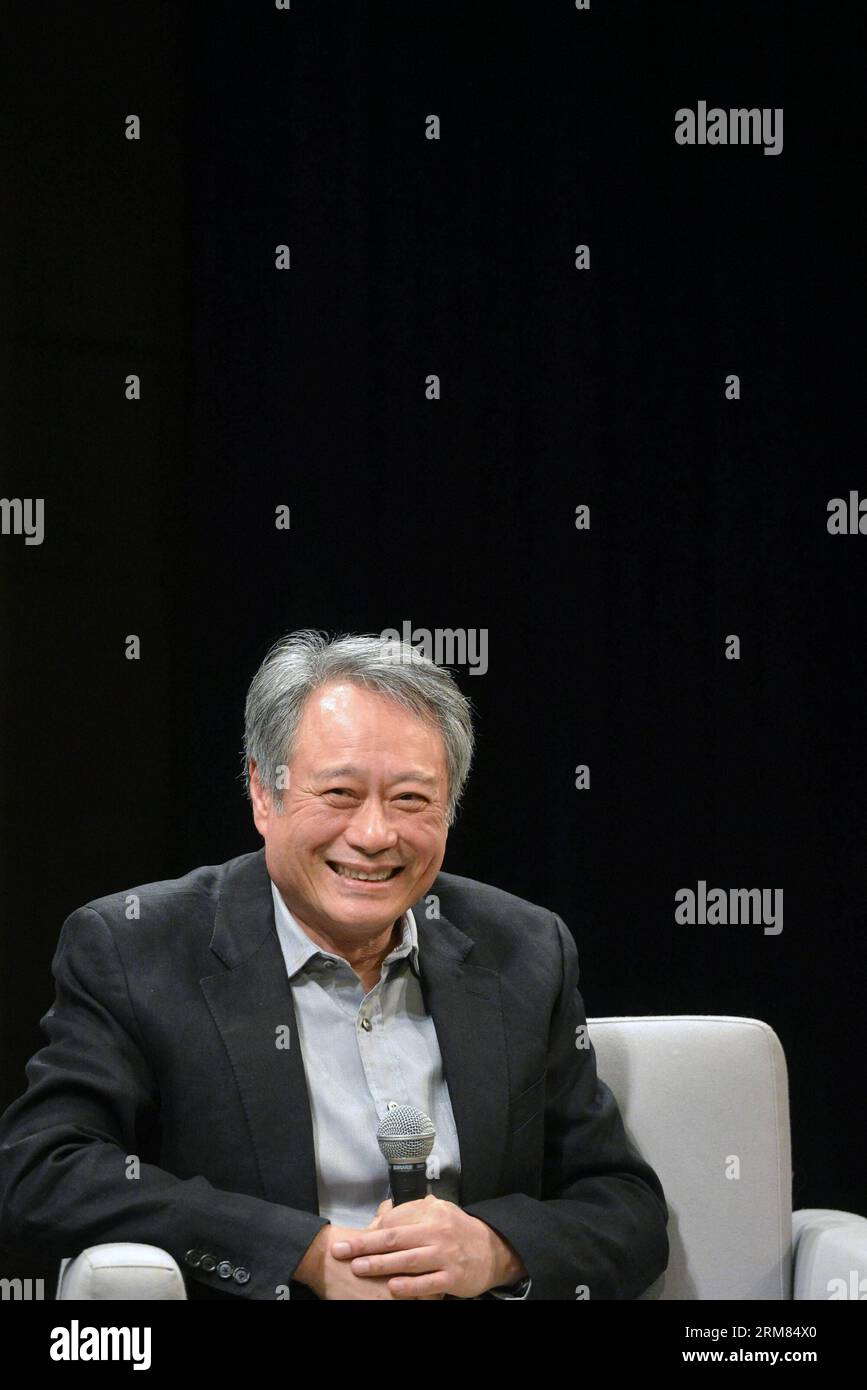 NEW YORK, March 27, 2014 (Xinhua) -- Two-time Oscar-winning director Ang Lee attends a dialog with renowned film director Zhang Yimou (not in the picture) in New York, the United States, March 27, 2014. The two film directors on Thursday held a dialog about Chinese film culture and Zhang s new movie Coming Home . (Xinhua/Wang Lei) (lyx) U.S.-NEW YORK-FILM DIRECTORS-ZHANG YIMOU-ANG LEE-DIALOGUE PUBLICATIONxNOTxINxCHN   New York March 27 2014 XINHUA Two Time Oscar Winning Director Ang Lee Attends a Dialogue With renowned Film Director Zhang Yimou Not in The Picture in New York The United States Stock Photo