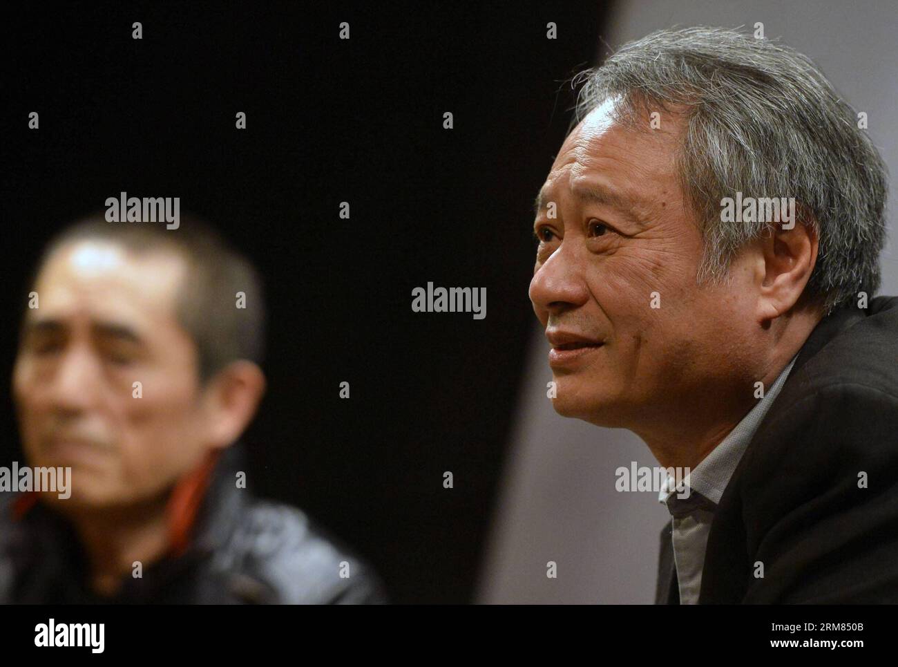 NEW YORK, March 27, 2014 (Xinhua) -- Two-time Oscar-winning director Ang Lee (R) and renowned film director Zhang Yimou attend a dialog in New York, the United States, March 27, 2014. The two film directors on Thursday held a dialog about Chinese film culture and Zhang s new movie Coming Home . (Xinhua/Wang Lei) (lyx) U.S.-NEW YORK-FILM DIRECTORS-ZHANG YIMOU-ANG LEE-DIALOGUE PUBLICATIONxNOTxINxCHN   New York March 27 2014 XINHUA Two Time Oscar Winning Director Ang Lee r and renowned Film Director Zhang Yimou attend a Dialogue in New York The United States March 27 2014 The Two Film Directors O Stock Photo