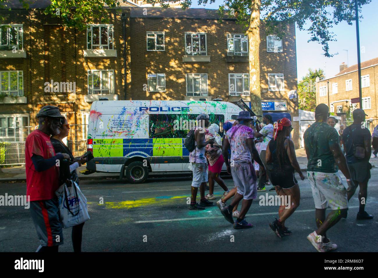Notting Hill, London, England. 27th August 2023. People taking part in the J'ouvert opening ceremony of Notting Hill Carnival 2023. Credit: Jessica Girvan/Alamy Live News Stock Photo