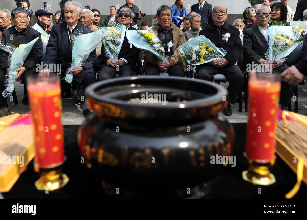(140405) -- NANJING, April 5, 2014 (Xinhua) -- Survivors and family members of the victims of the Nanjing Massacre in 1937 mourn for the deceased during a memorial ceremony in the Memorial Hall of the Victims in Nanjing Massacre by Japanese Invaders, in Nanjing, capital of east China s Jiangsu Province, April 5, 2014, also the Qingming Festival, or the Tomb-Sweeping Day. Lots of citizens came here to mourn Nanjing Massacre victims on Saturday. (Xinhua/Han Yuqing) (wf) CHINA-NANJING-QINGMING FESTIVAL-NANJING MASSACRE-MEMORIAL CEREMONY (CN) PUBLICATIONxNOTxINxCHN   Nanjing April 5 2014 XINHUA Su Stock Photo